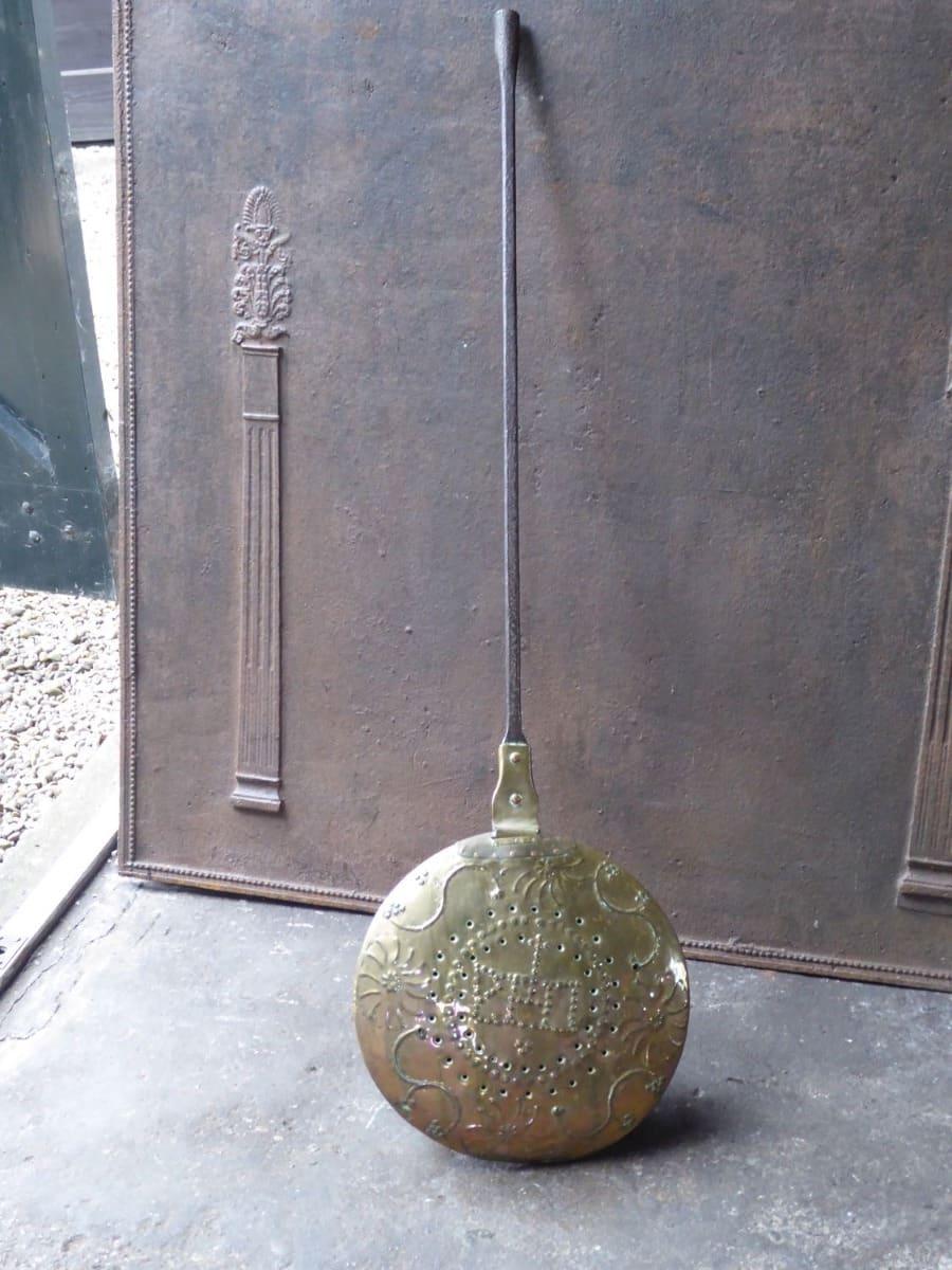 18th century French Louis XV Period hot water bottle/bed pan.

It is used for heating up a pan or to keep it warm in front of the fire. In a good working condition.