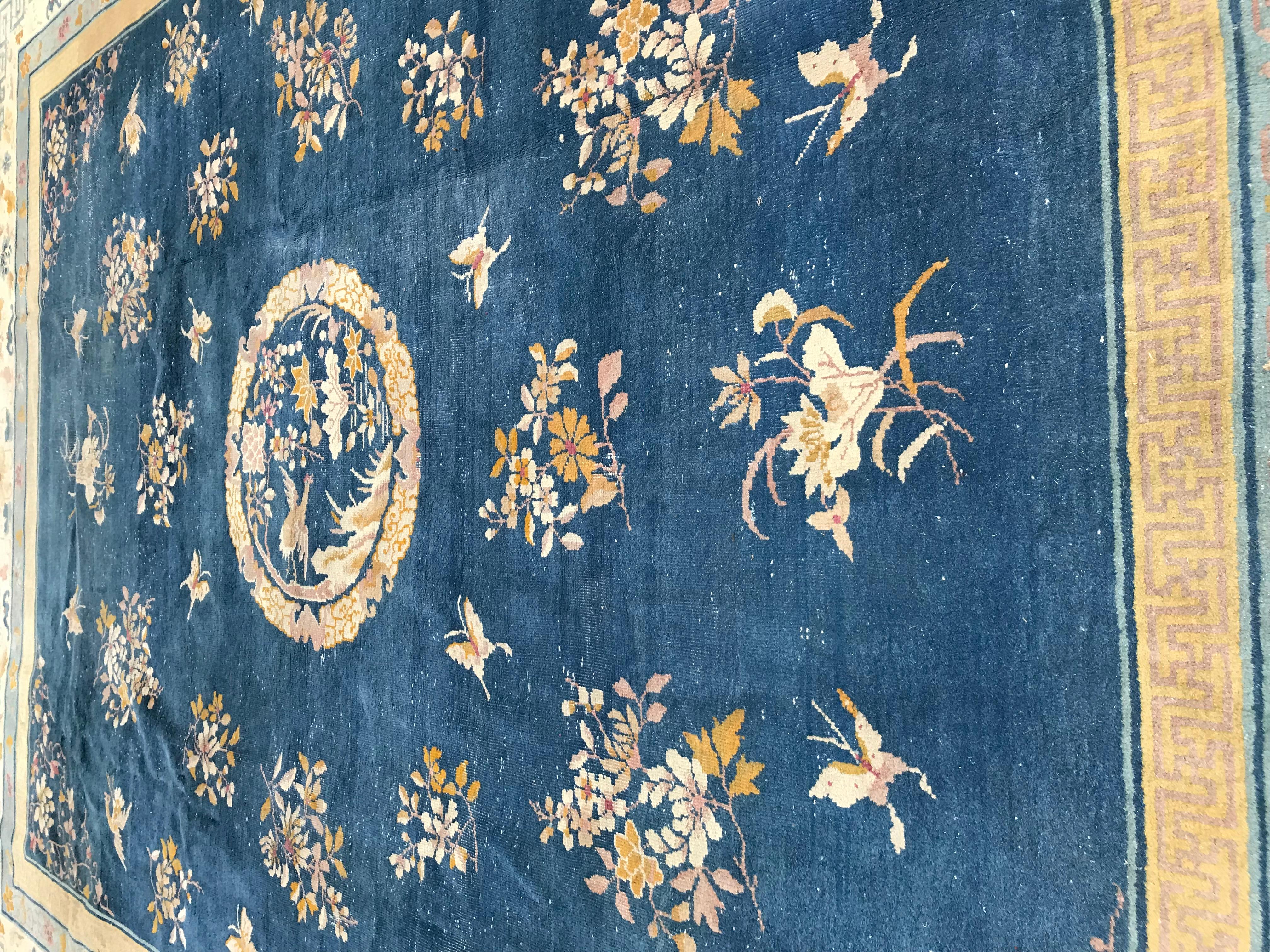 Beautiful antique large Chinese rug, from Indo-China, with nice patterns and a blue field color, decorative, circa 1900 entirely hand knotted with wool velvet on cotton foundations, some wears.


 