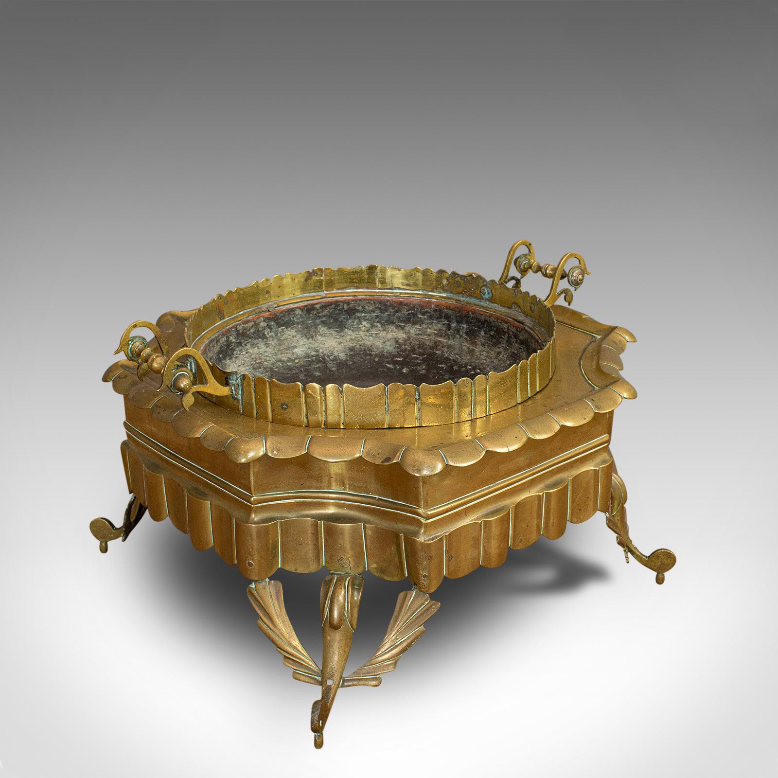 This is a large antique Islamic fire pit. An Arabic, brass ceremonial brazier, dating to the late 19th century, circa 1900.

Rich hues and appealing form
Displays a desirable aged patina
Polished brass shows fine golden hues
Liner generously