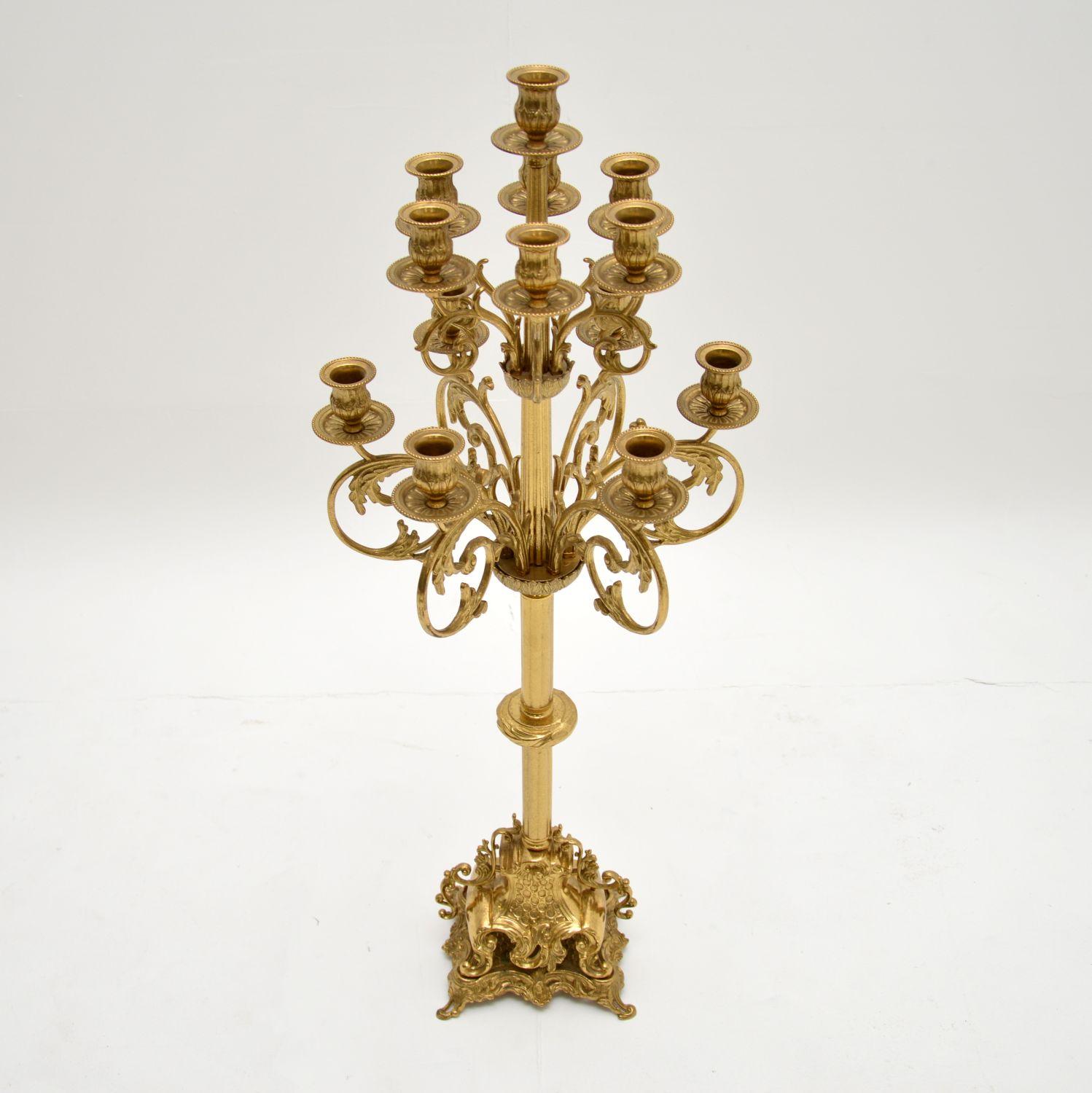 A stunning, very large and very impressive solid brass candelabra. This was made in Italy & dates from around the 1930-50’s.

The quality is superb, this has fine details throughout and is beautifully finished on all sides.

It is in excellent