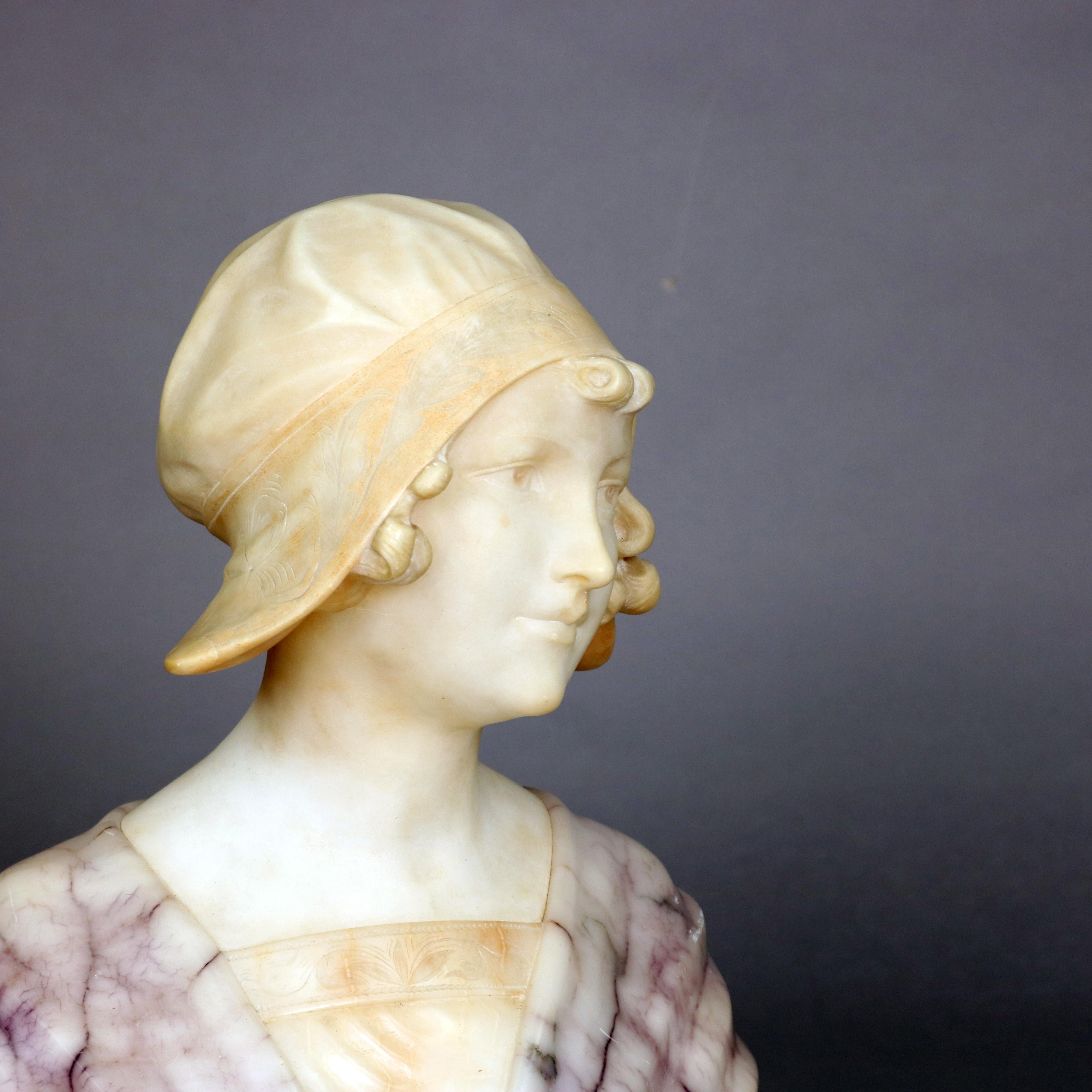 A large and antique Italian carved portrait bust after Giuseppe Bessi depicts portrait of Joan of Arc in deeply striated alabaster, circa 1890

Measures: 14