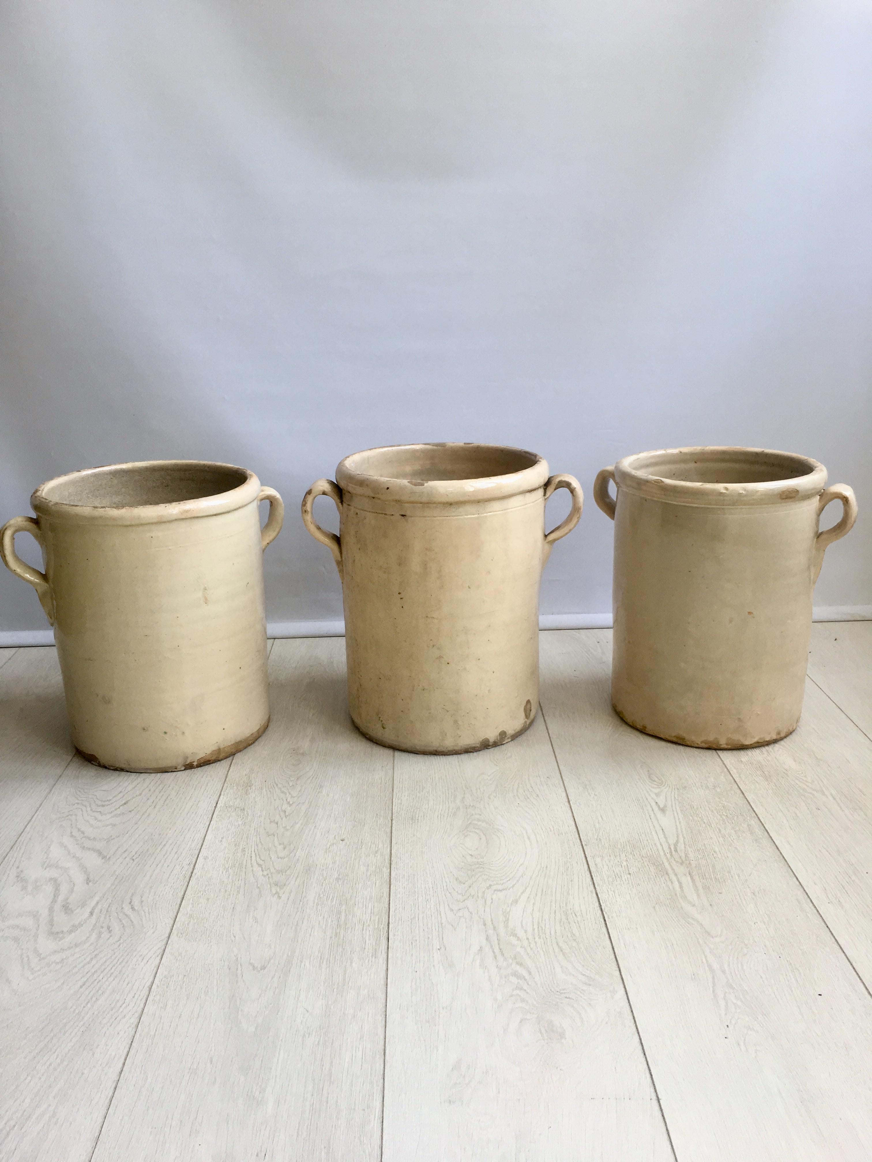 As large as they come, a beautiful 19th century creamy white Italian glazed confit pot from the Bay of Naples. 

Originally used for preserving foods including anchovies, sardines and olives in olive oil. 

The larger size is perfect for small