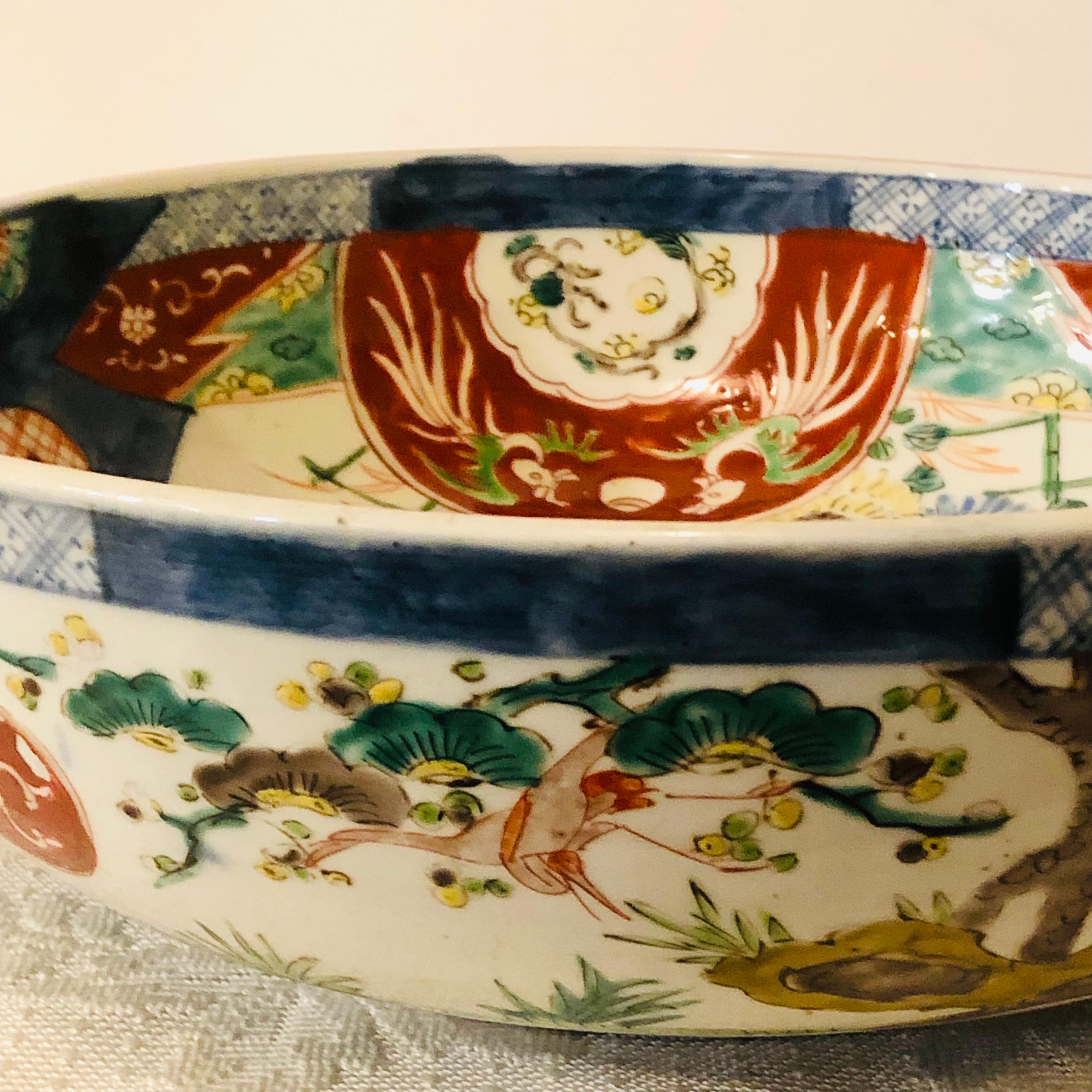 Large Antique Japanese Imari Bowl Decorated With Whimsical Birds and Trees 4