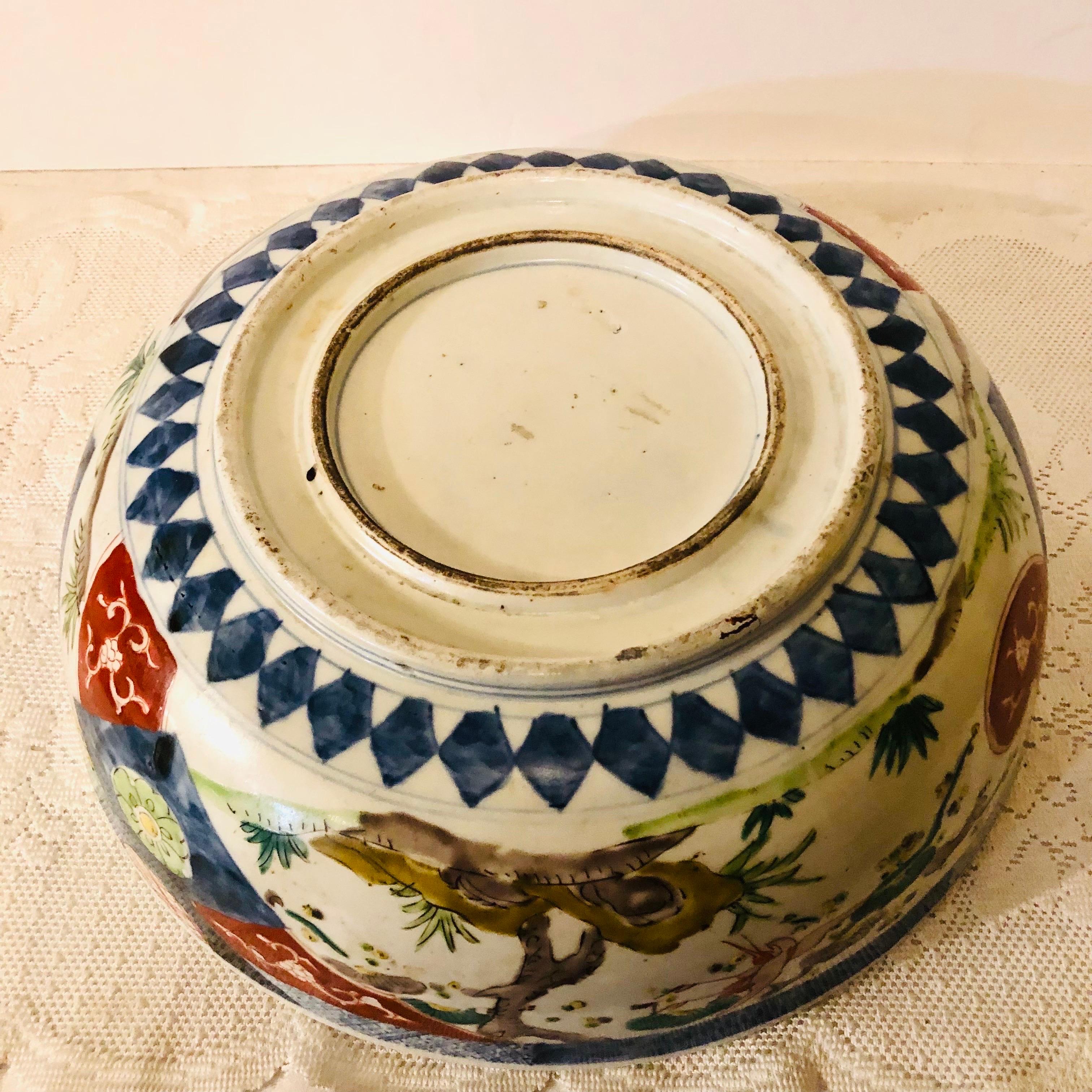 Large Antique Japanese Imari Bowl Decorated With Whimsical Birds and Trees 6