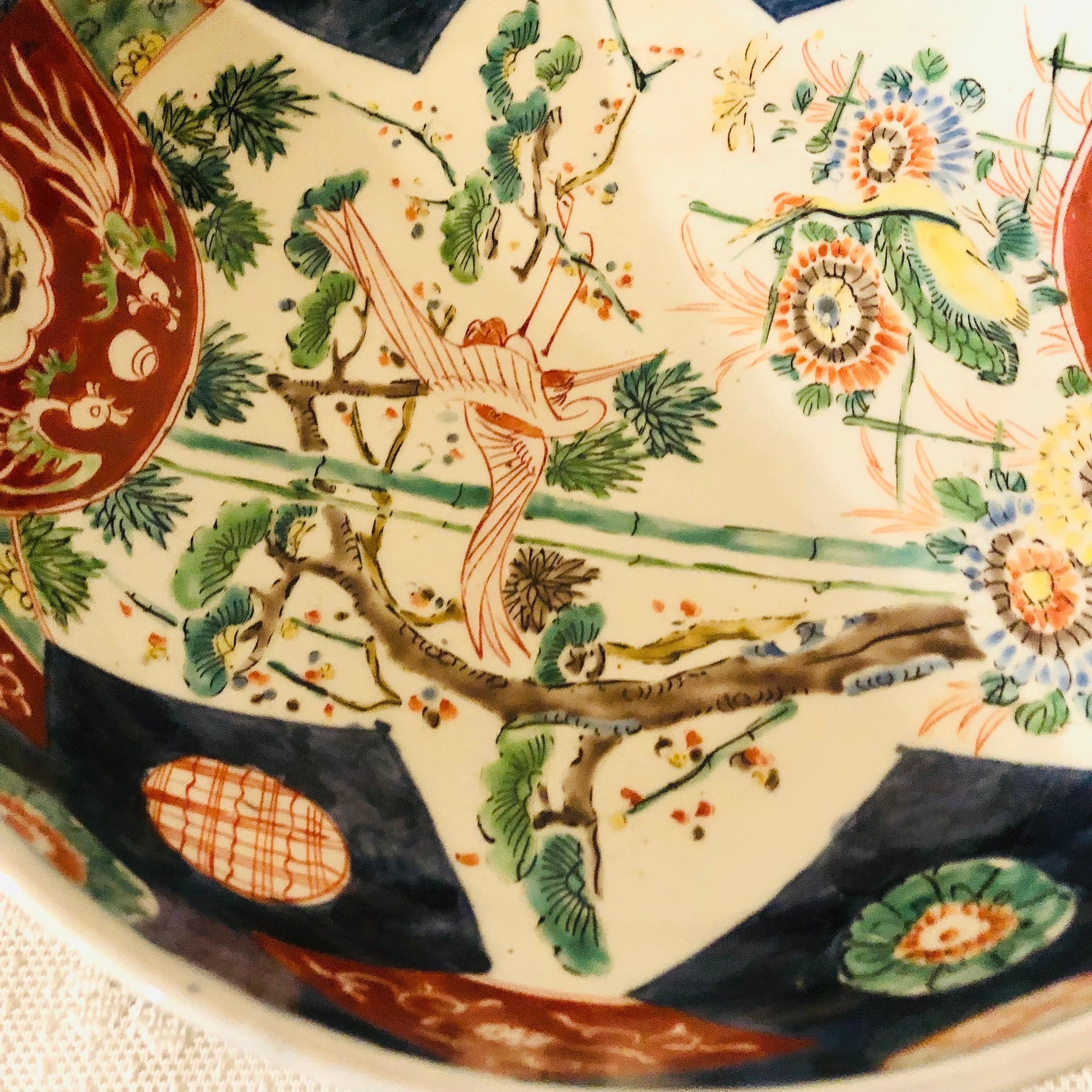 Large Antique Japanese Imari Bowl Decorated With Whimsical Birds and Trees 7