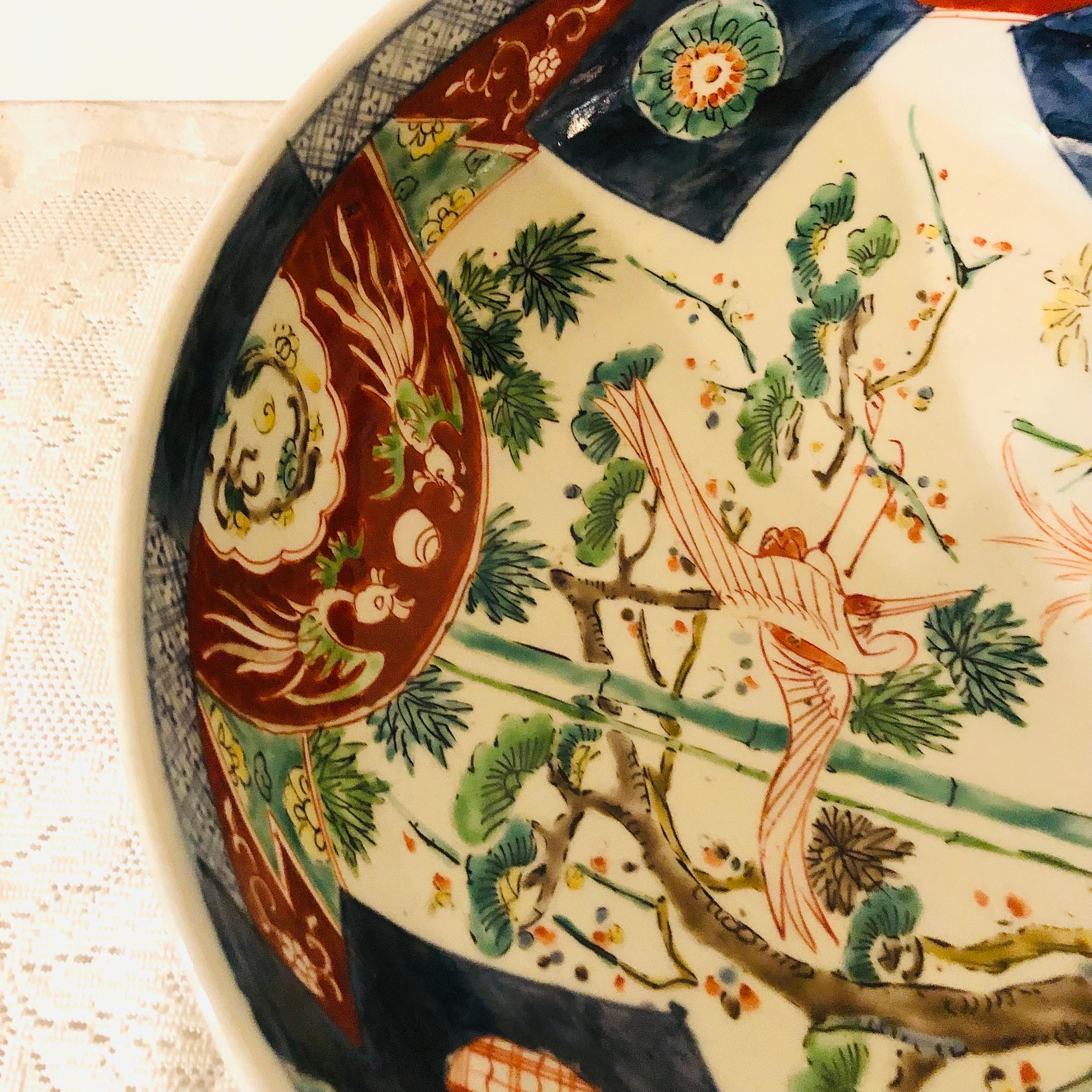Large Antique Japanese Imari Bowl Decorated With Whimsical Birds and Trees 8