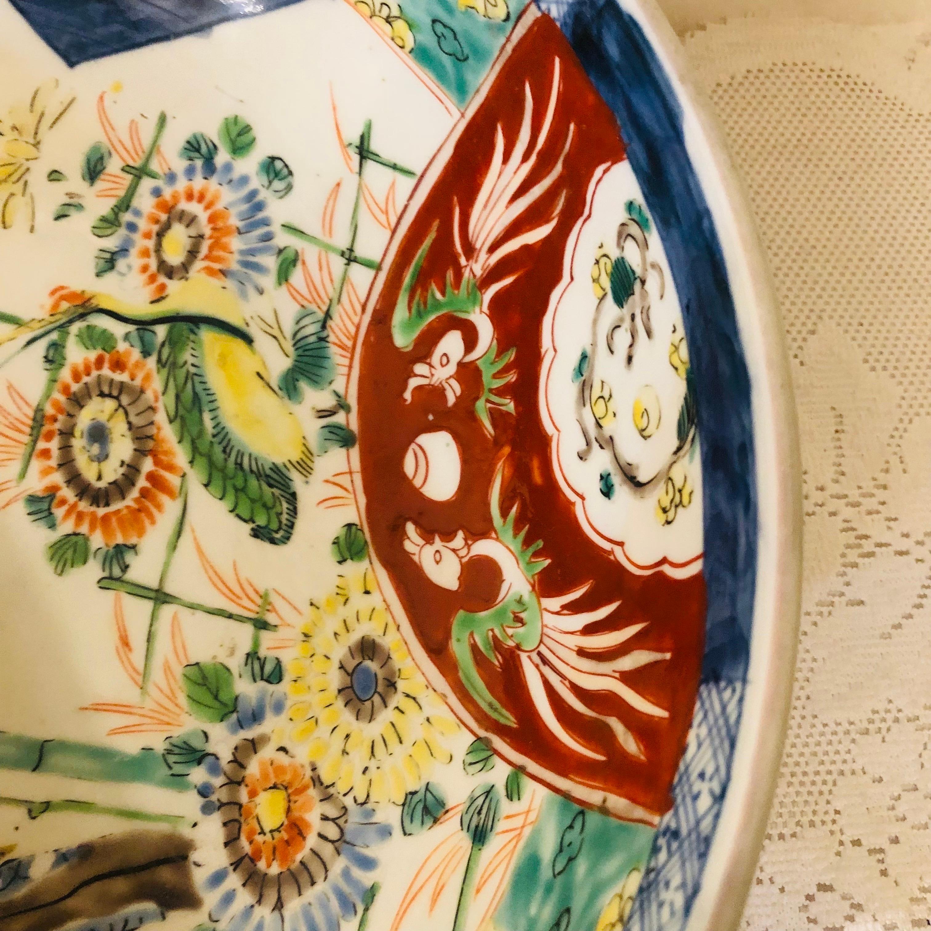 Large Antique Japanese Imari Bowl Decorated With Whimsical Birds and Trees 10