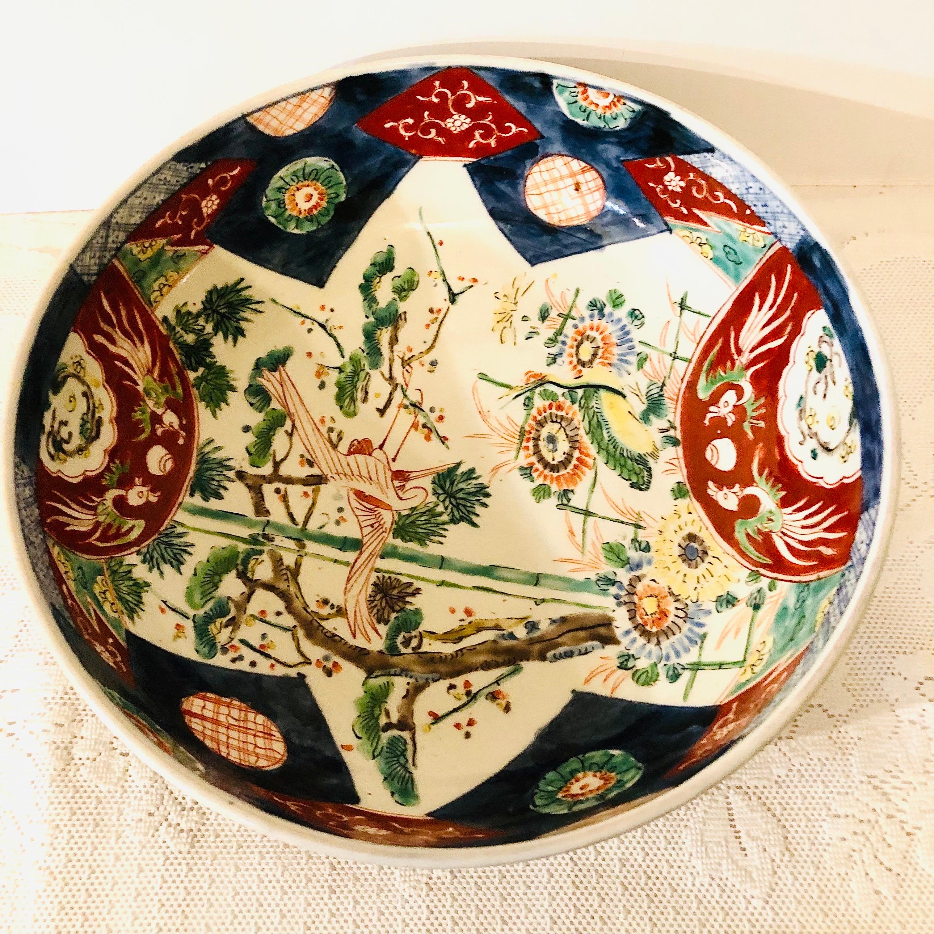 Large Antique Japanese Imari Bowl Decorated With Whimsical Birds and Trees 11