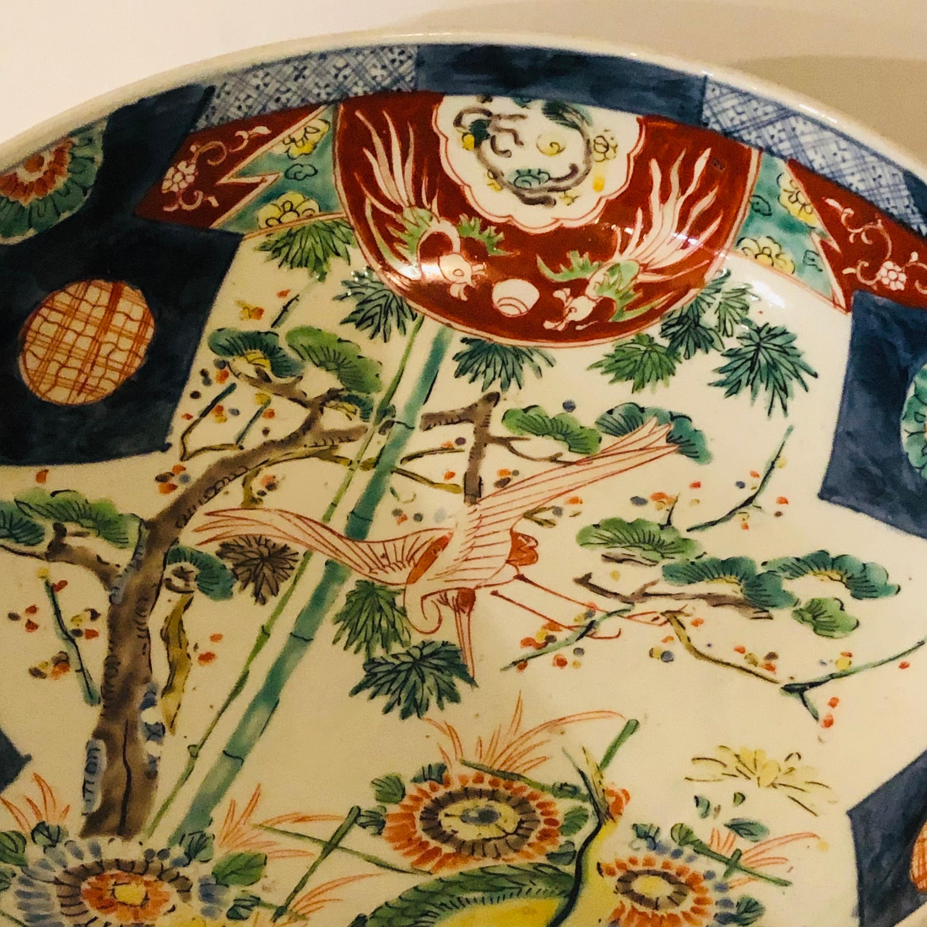 Large Antique Japanese Imari Bowl Decorated With Whimsical Birds and Trees 2