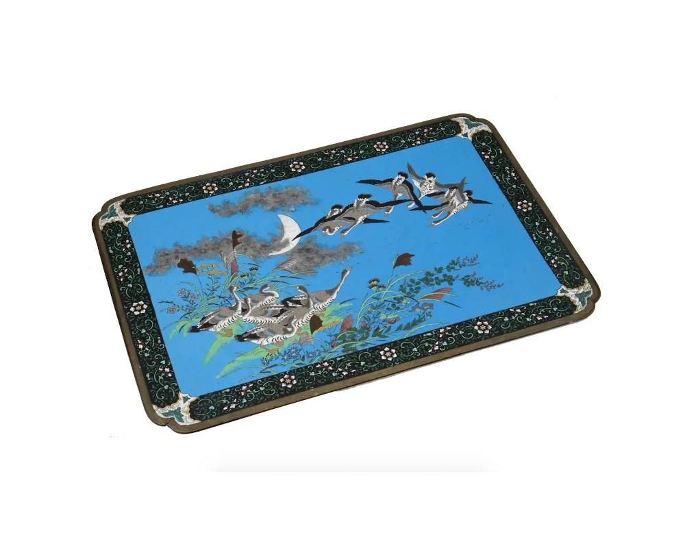 Large Meiji Japanese Cloisonne Enamel Panel of Geese Flying over the Moon Sky


A large antique Japanese, late Meiji era, enamel over brass wall panel. The panel is enameled with a polychrome image of naturalistic ducks in a landscape with a half