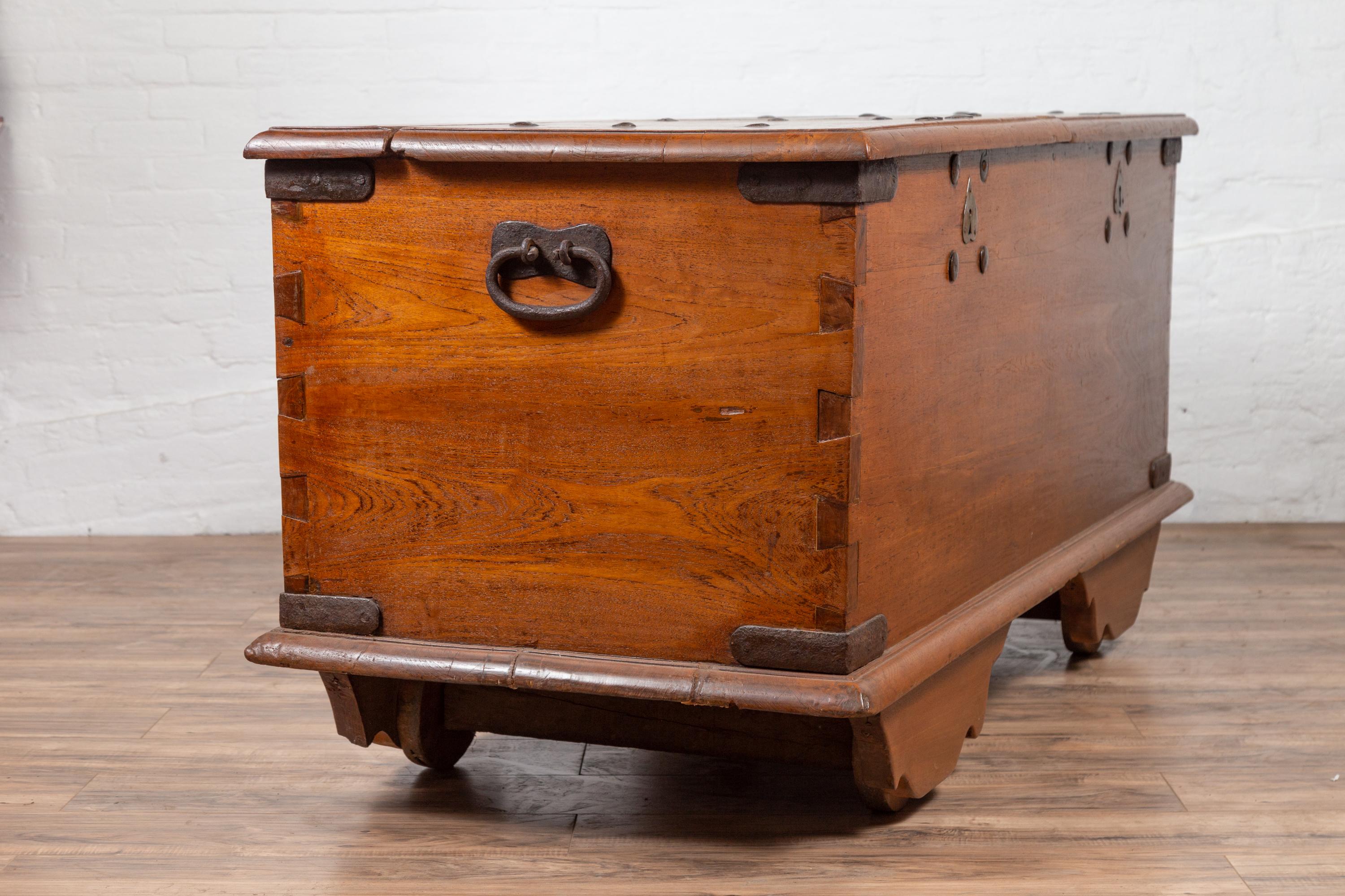 Large Antique Javanese Teak Wood Blanket Chest on Wheels with Iron Nailheads For Sale 4