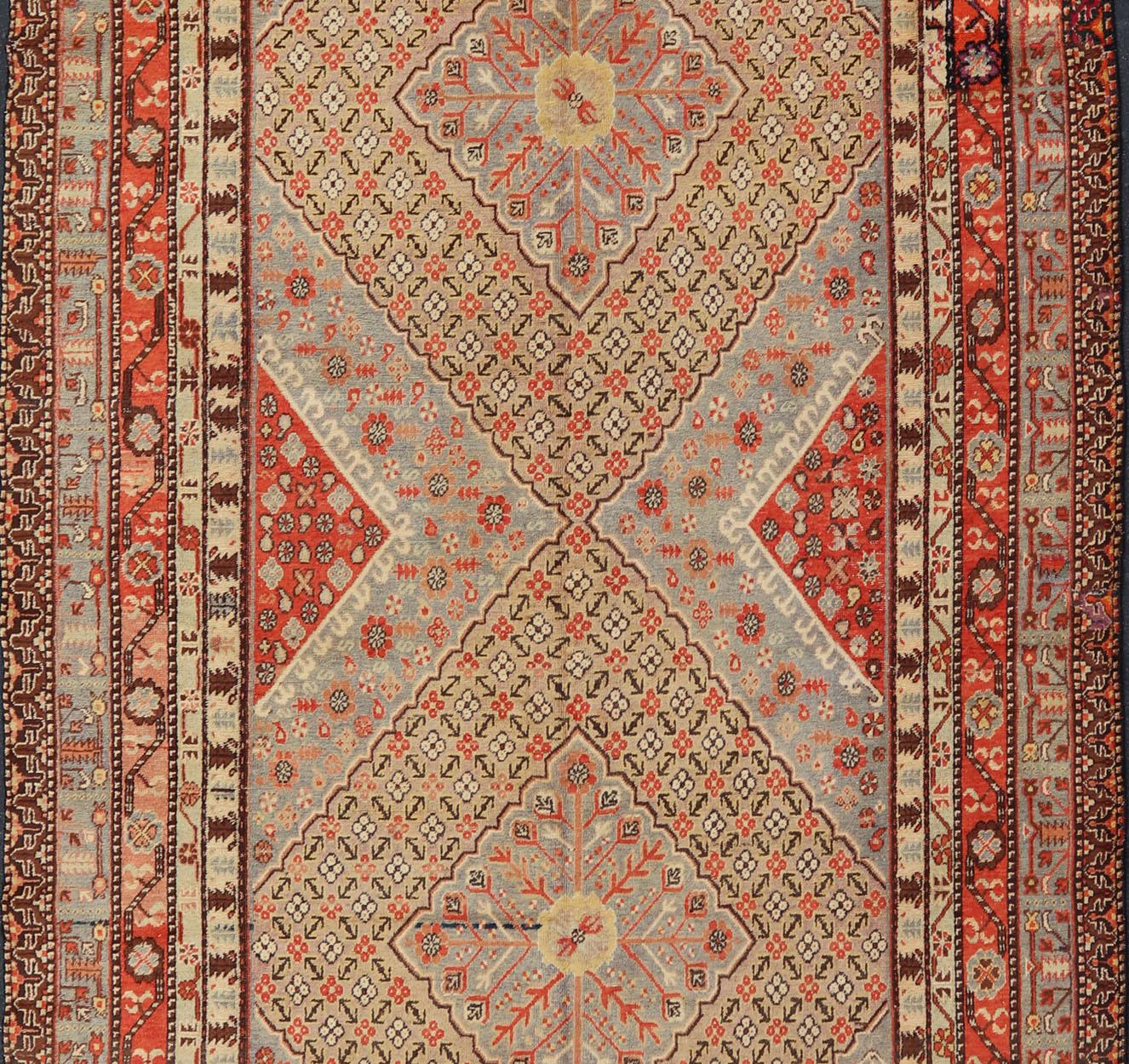 Large Antique Khotan Gallery Rug with Diamonds in Yellow, Orange, Brown & Gray In Good Condition For Sale In Atlanta, GA