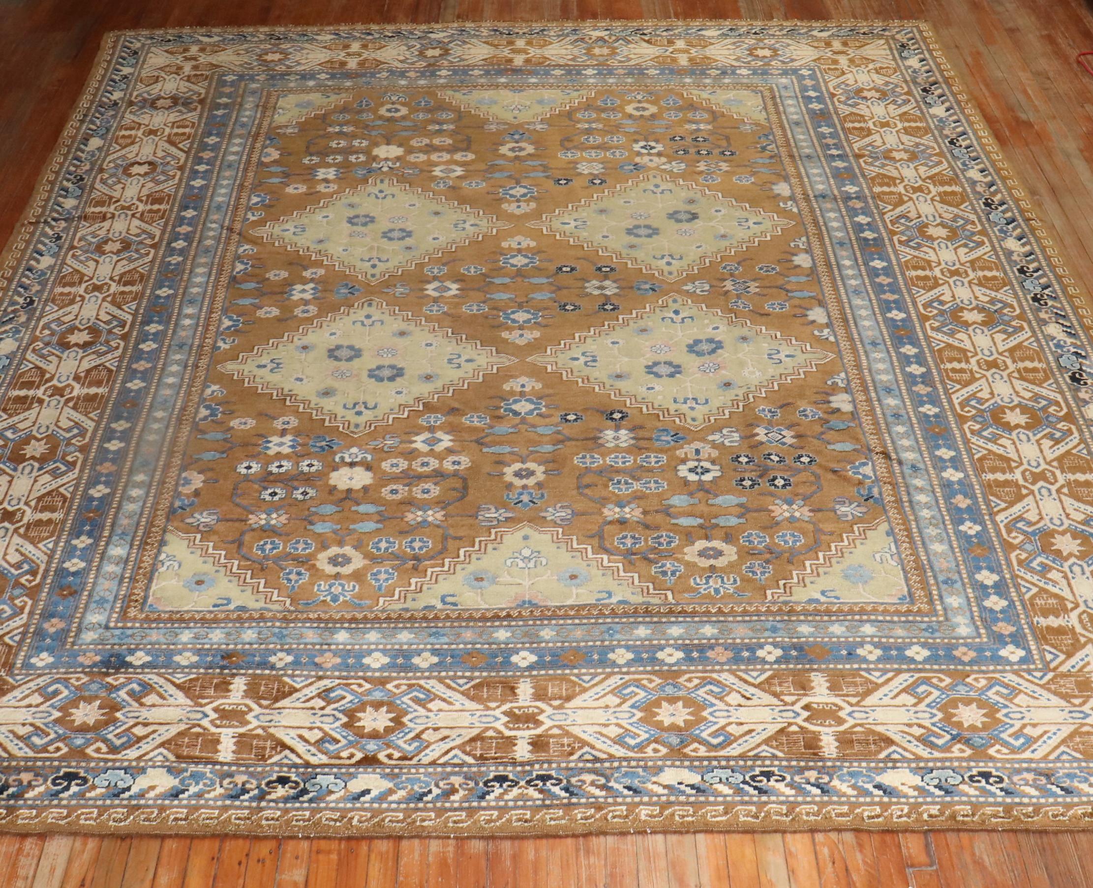 Rare Room size Antique Khotan Rug from the 1st quarter of the 20th Century

Measures: 10'10