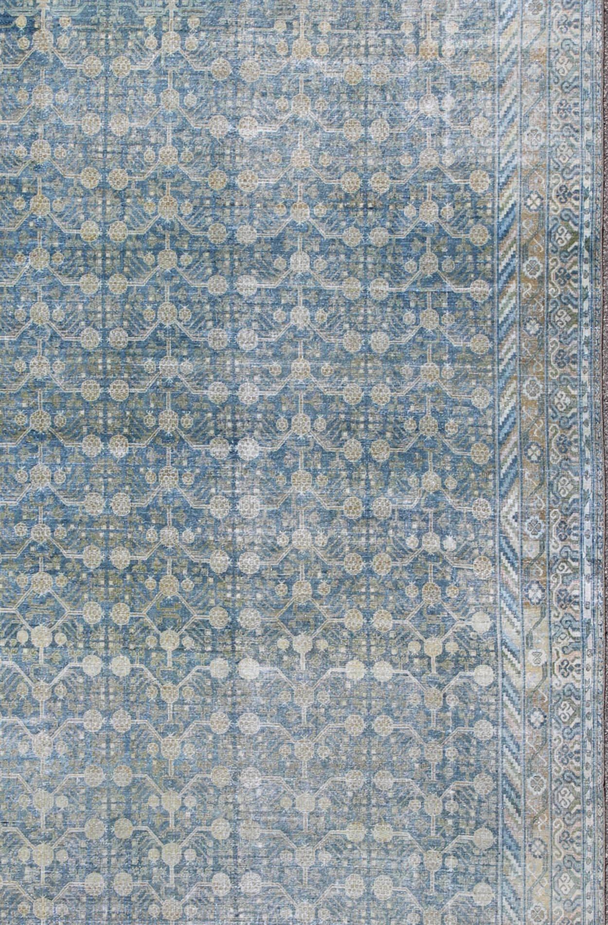 East Turkestani Large Antique Khotan Rug with Blue All-Over Design of Blossoms and Flowers For Sale
