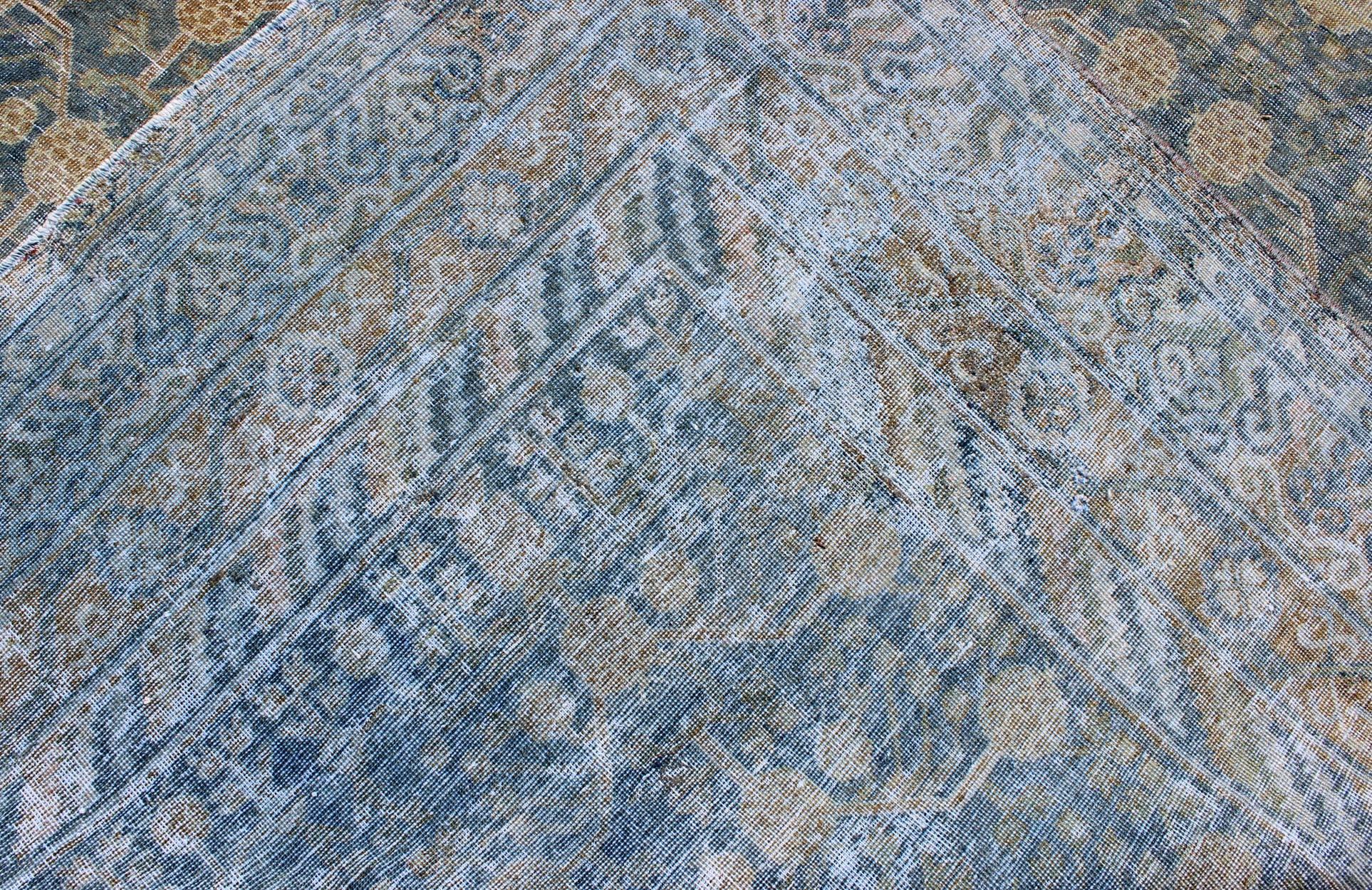 Early 20th Century Large Antique Khotan Rug with Blue All-Over Design of Blossoms and Flowers For Sale