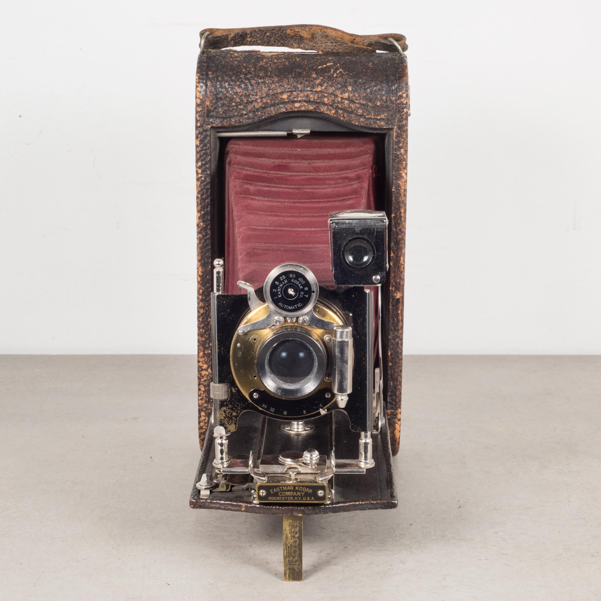 About

This is an original large Eastman Kodak No. 3A folding camera with red bellows. The body is wrapped in leather with chrome and brass accents. The camera folds to 2 inches. This piece has retained its original finish with minor structurally