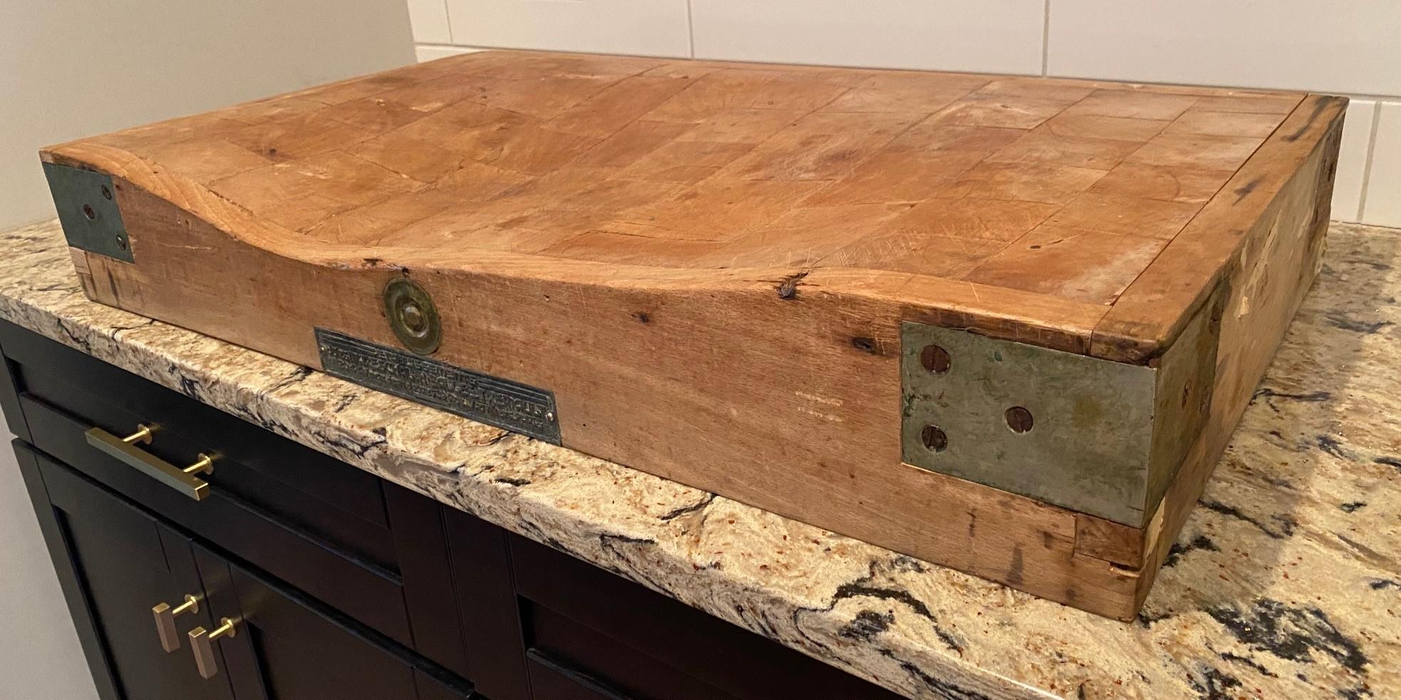 Late 19th c. unrestored French butcher block with original brass brackets and brass plaque showing makers names and Parisian addresses. The original 8.5