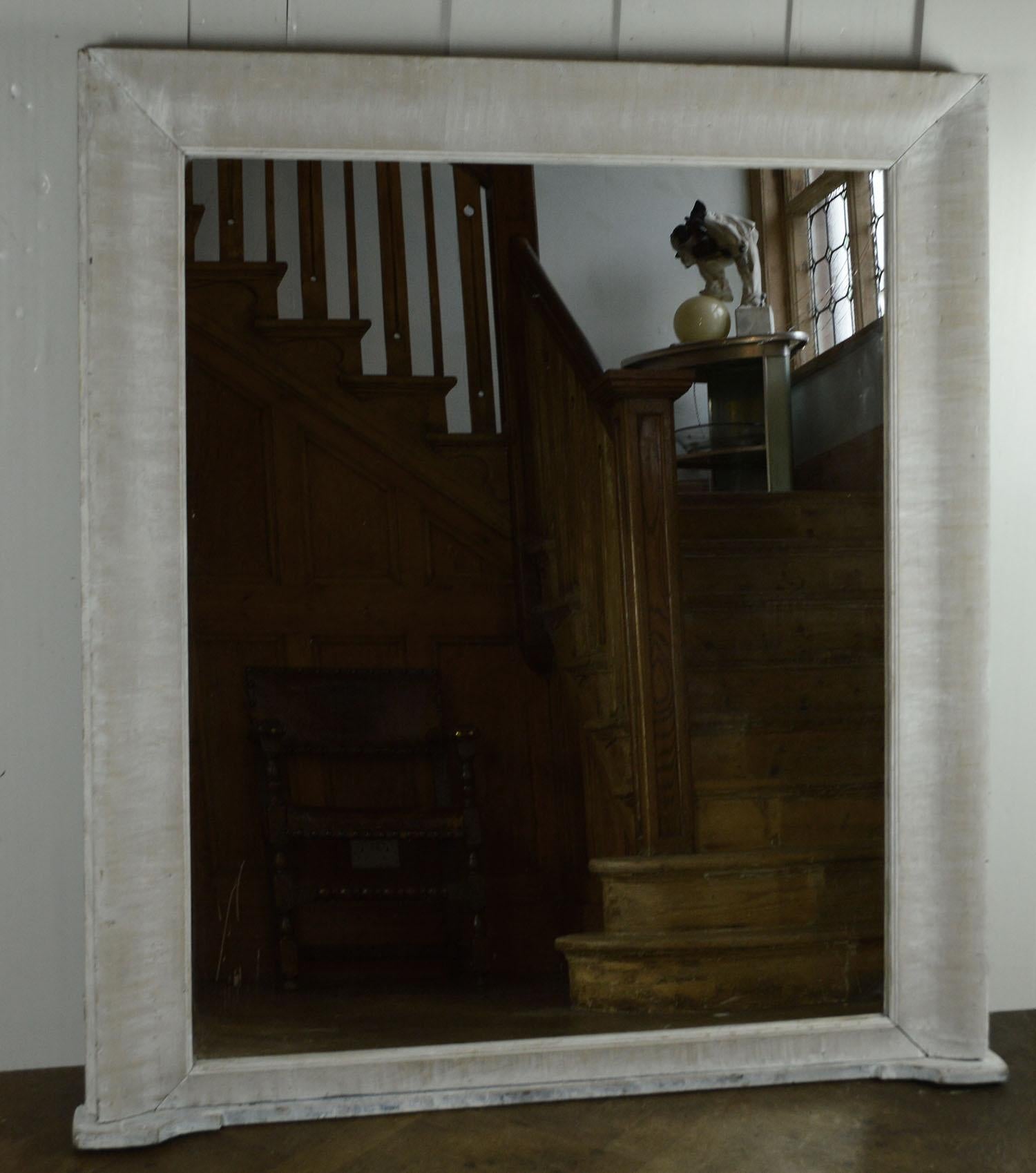 Super limed pine mirror.

Wonderful simple lines. 

With its unusual flat base it is ideal for over a fireplace or a console table.

It has been recently limed.

The mirror plate is new. It has been slightly distressed particularly in the