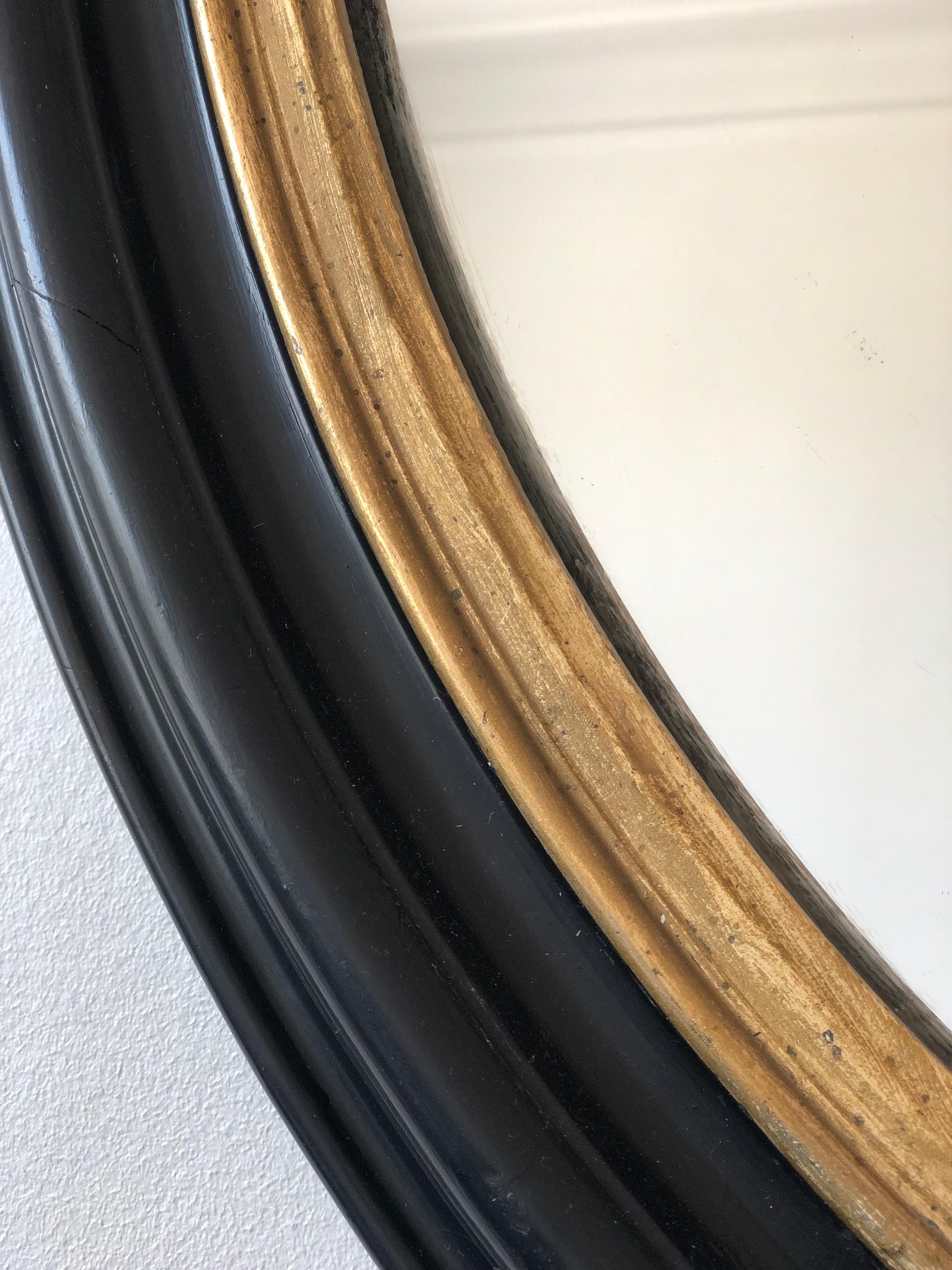 Gilt Large Antique Louis Philippe French Oval Mirror in Black and Gold, 19th Century For Sale