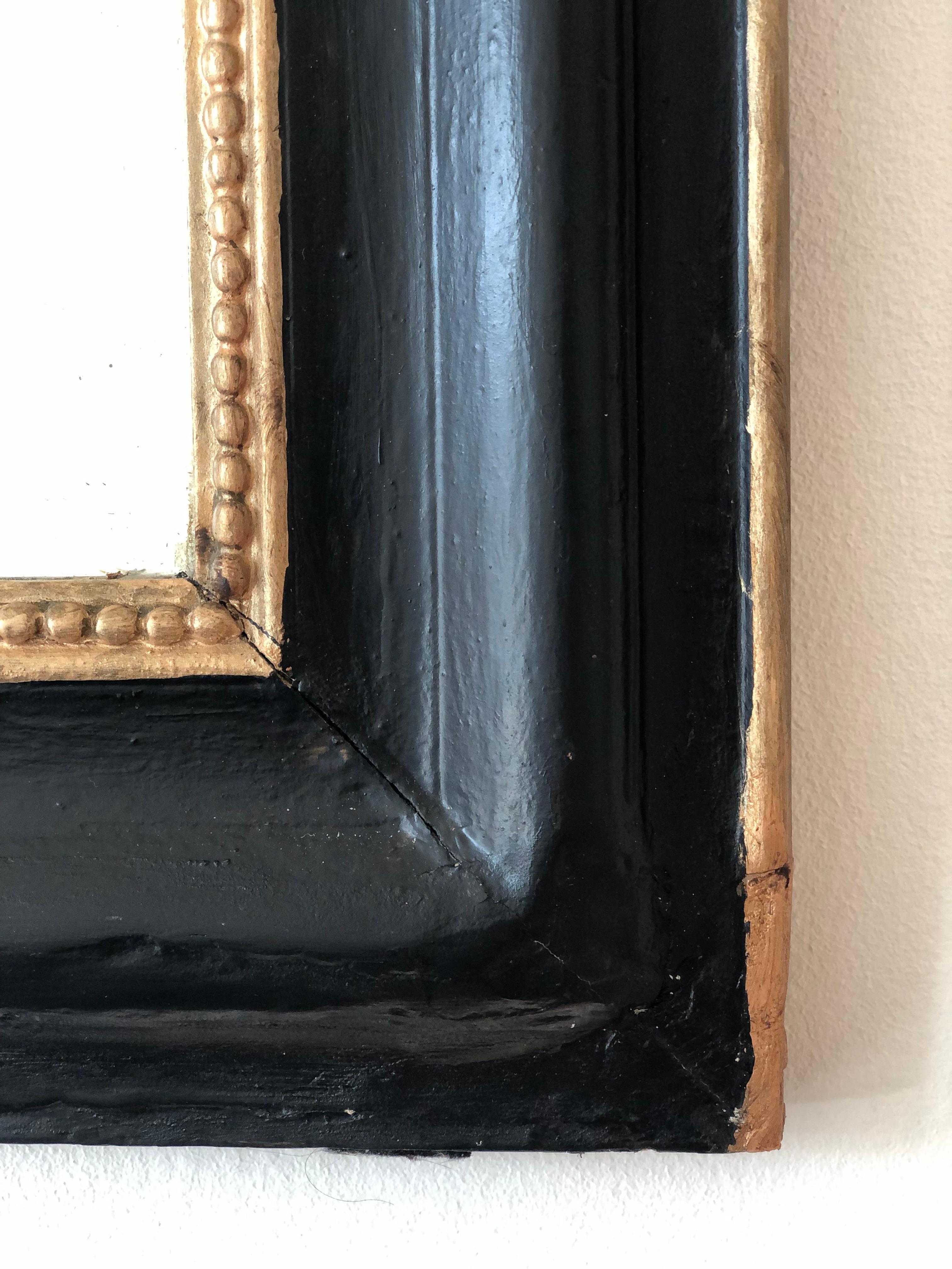 French Large Antique Louis Philippe Mirror in Black and Gold France Late 19th Century