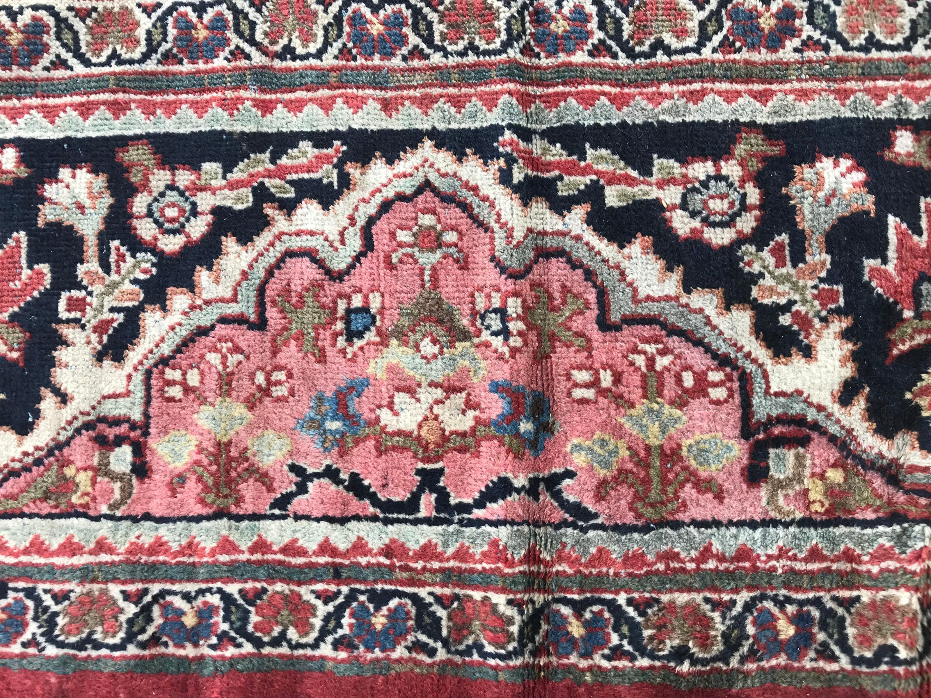 Beautiful late 19th century Mahal style rug with nice floral design and a central medallion, and nice natural colors with red, blue, green, yellow and orange, entirely hand knotted with wool velvet on cotton foundation. Measures: 10ft 6in x 13ft 9in.