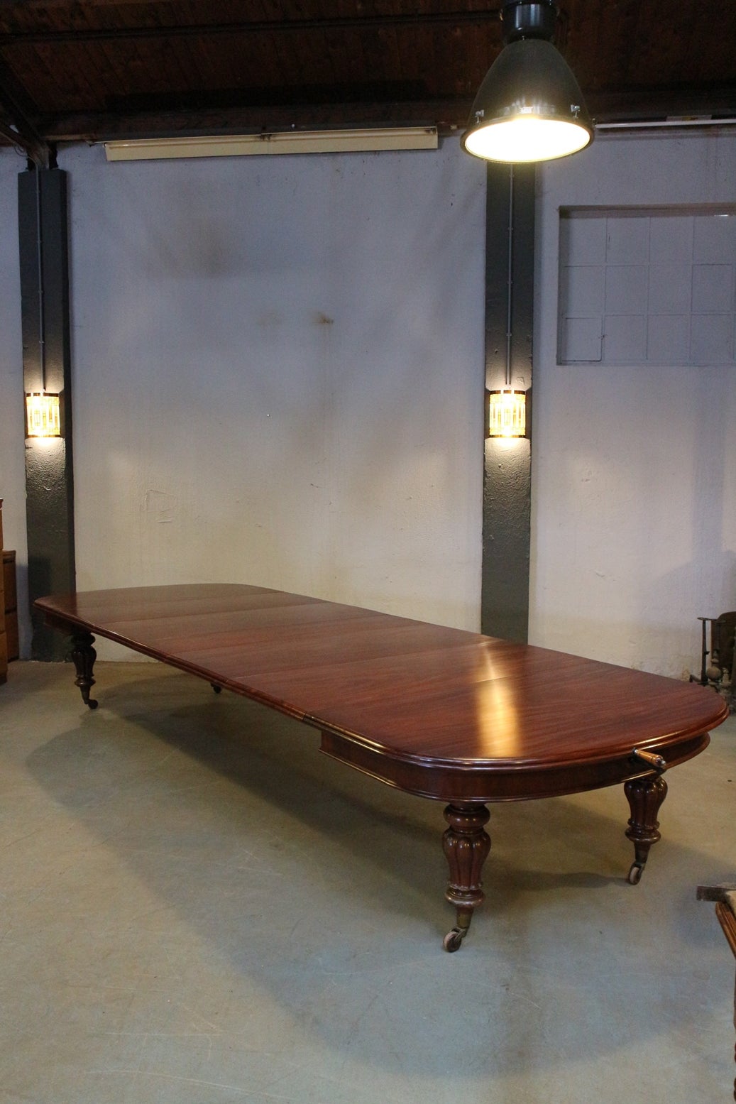 Large Antique mahogany Dining table / conference table Very large antique English table with 5 original leaves, all in perfect condition. Beautiful stylish leg. Beautiful and very solid antique dining room table / conference table. Superb mahogany.