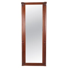Grand miroir ancien en acajou avec colonnes et motifs sculptés, datant du XIXe siècle