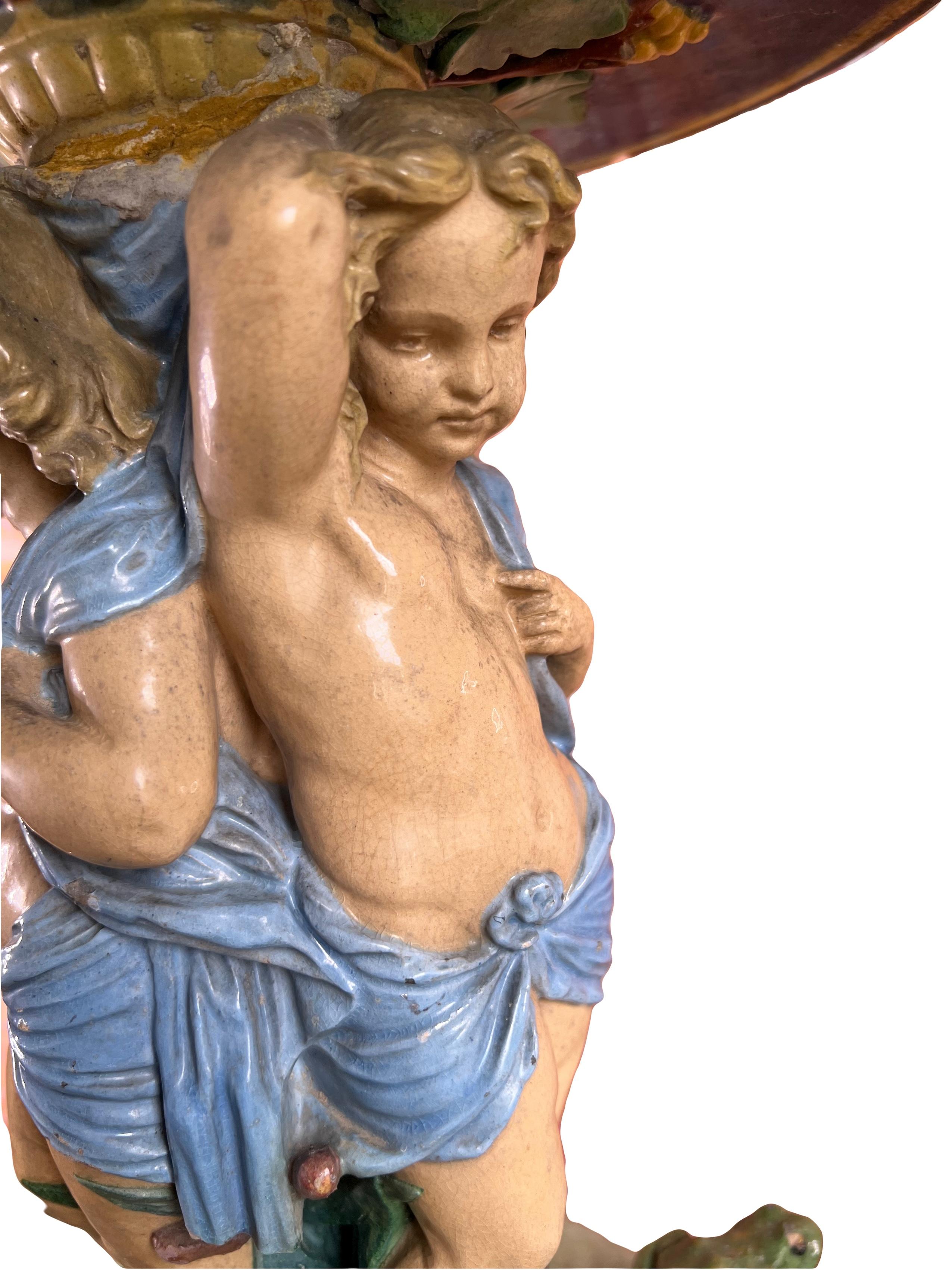 Terracotta Large antique majolica centerpiece with putti and frog 19th For Sale