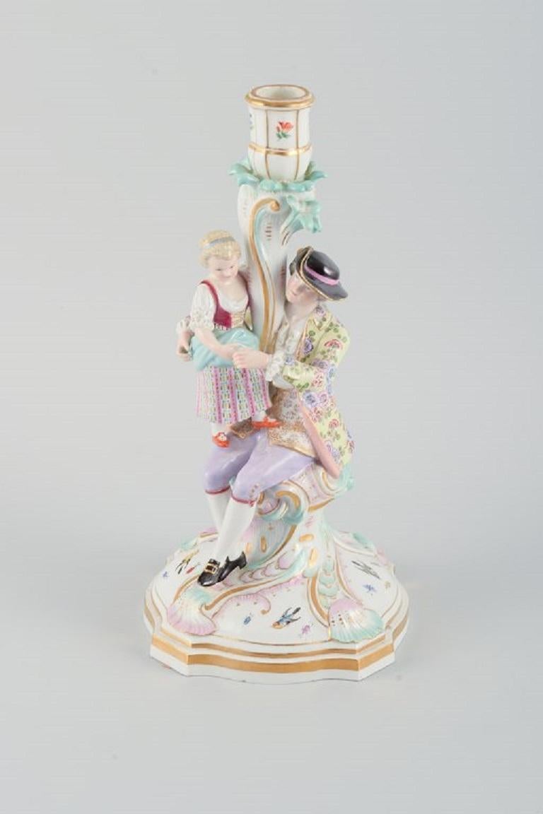 Large antique Meissen candlestick in hand-painted porcelain decorated with flowers, insects and birds. Man and girl.
19th century.
Measures: 31.0 x 17.0 cm.
In excellent condition.
Marked.
First factory quality.