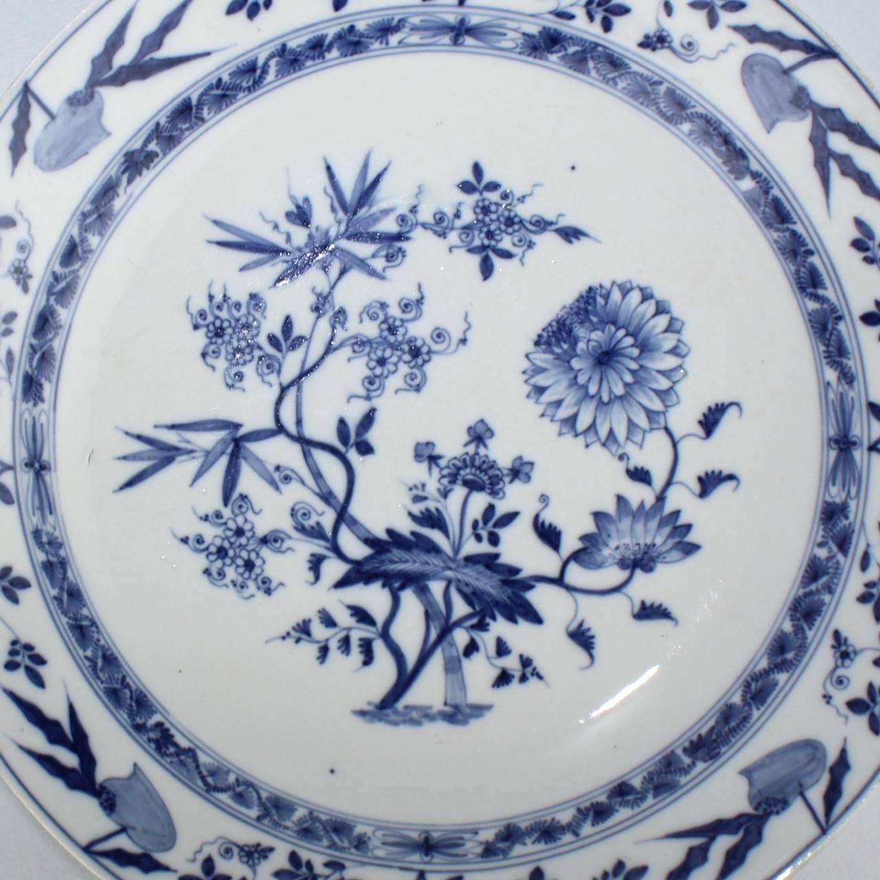 A fine and rare Meissen porcelain Blue Onion or 'Zwiebelmuster' porcelain charger.

The charger dates to Marcolini Period of Meissen porcelain production, which spanned from the late 18th to the early 19th century. It has the typical blue and