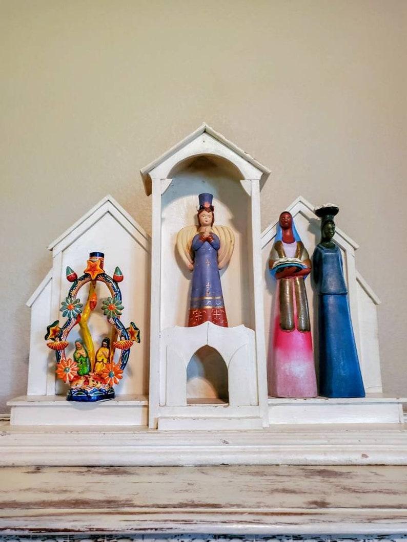 An antique Mexican hand-crafted architectural church cathedral carved, distressed painted white wooden religious folk art niche - altarpiece from the early 20th century. Use for home shrines, votive offerings, display Retablo, Santo figures,