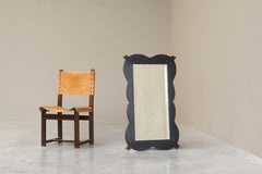 Grand Antique Mirror en Wood ébonisé et verre miroir facetté et patiné