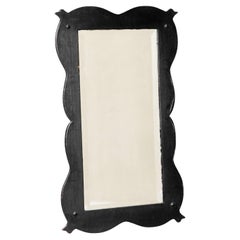 Large Antique Mirror in Ebonized Wood and Facetted and Weathered Mirror Glass