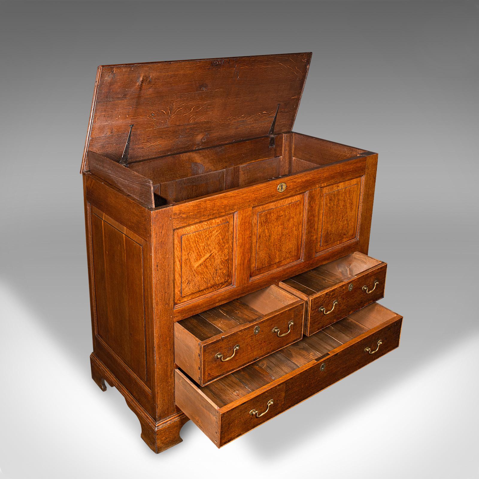 This is a superb Georgian period mule chest, offering grand proportions and high country house appeal, circa 1780. Crafted in solid oak, this handsome antique coffer features hidden compartments, practical storage, and refined period