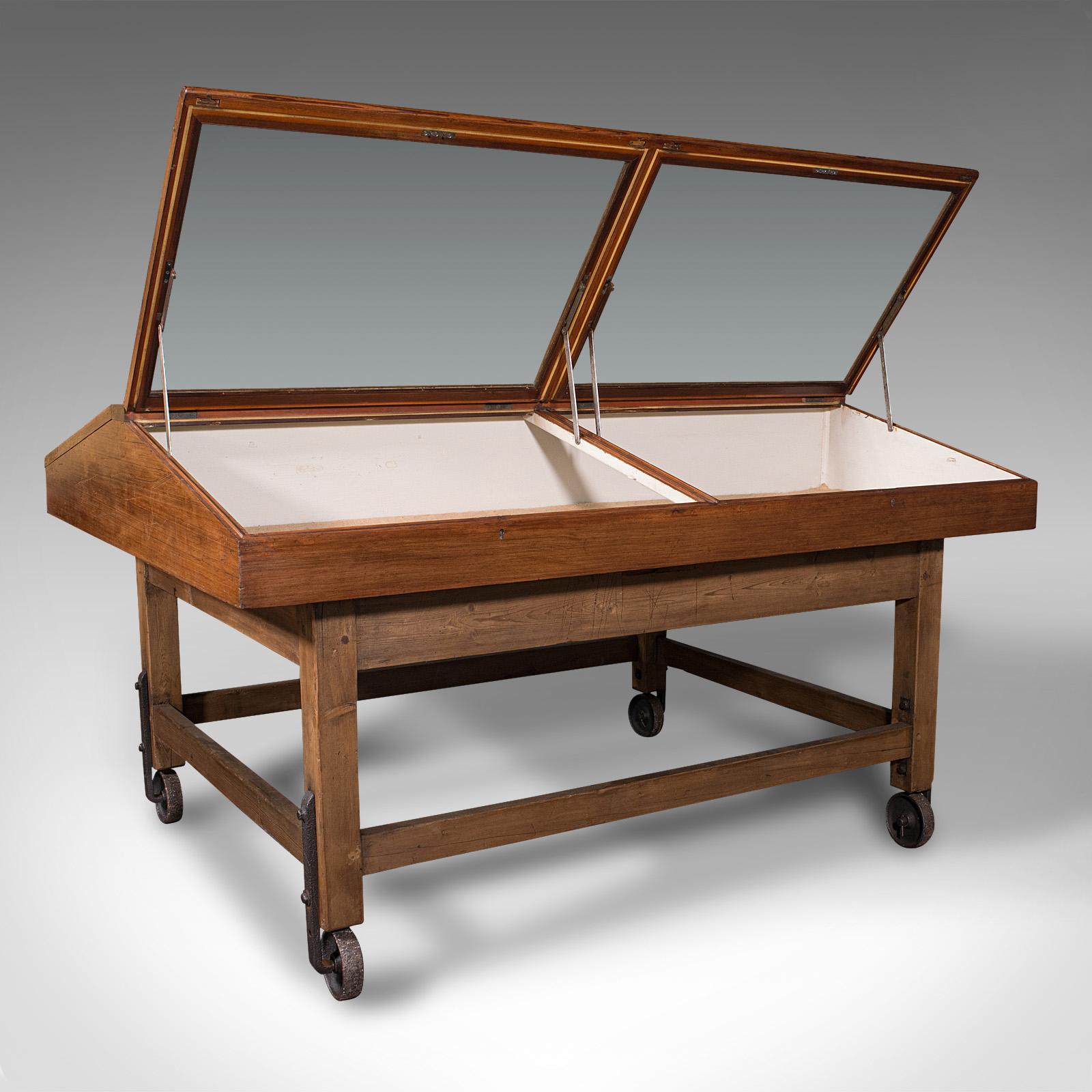 This is a large antique museum showcase. An English, pitch pine and glass display cabinet on stand, dating to the late Victorian period, circa 1900.

Of superior, museum quality throughout
Displays a desirable aged patina and in good