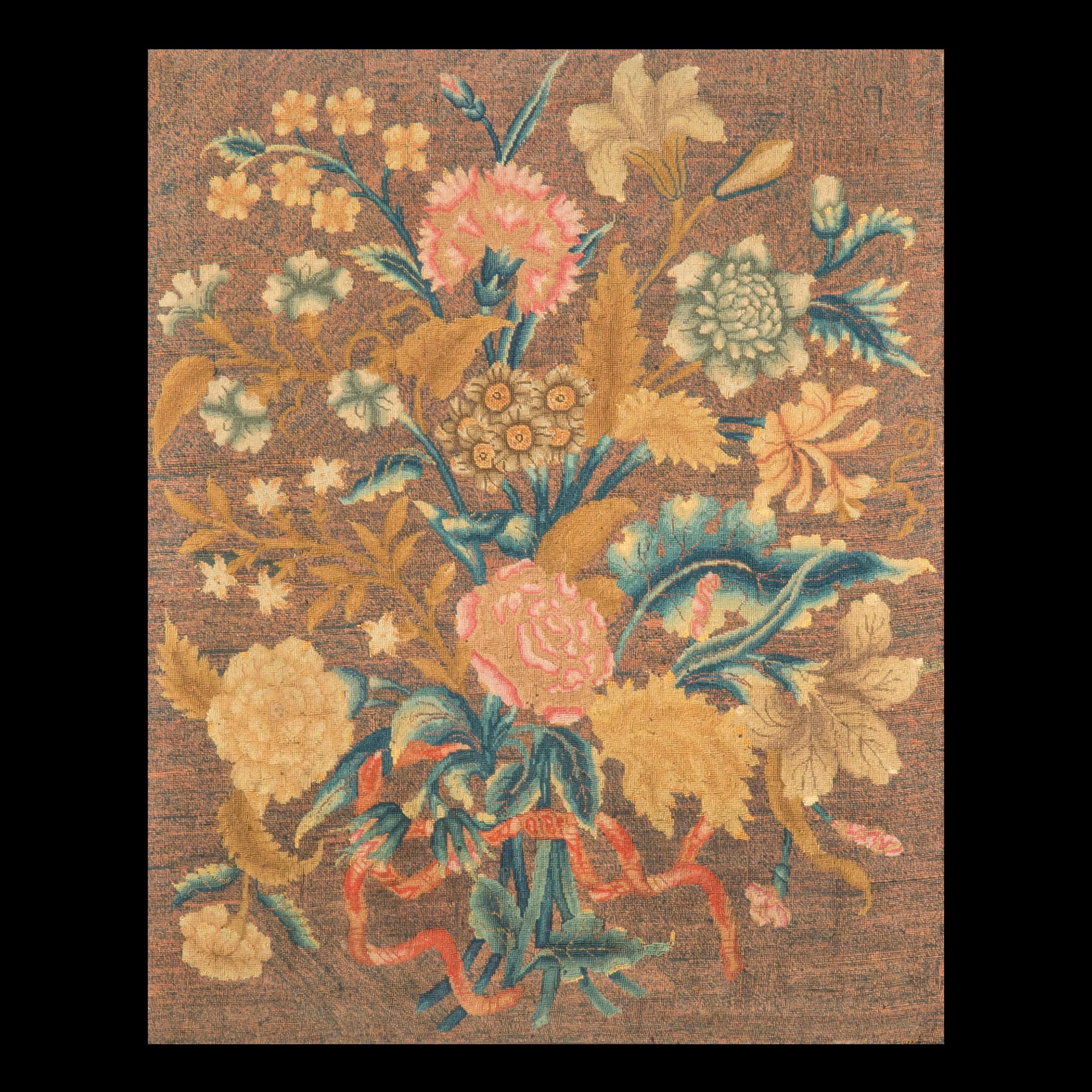 An exquisite early to mid-18th century English petit-point needlework tapestry picture, of floral design,
circa 1730-1750.

Why we like it
This is an incredibly rare example of needlework exquisitely embroidered in petite-point throughout, for