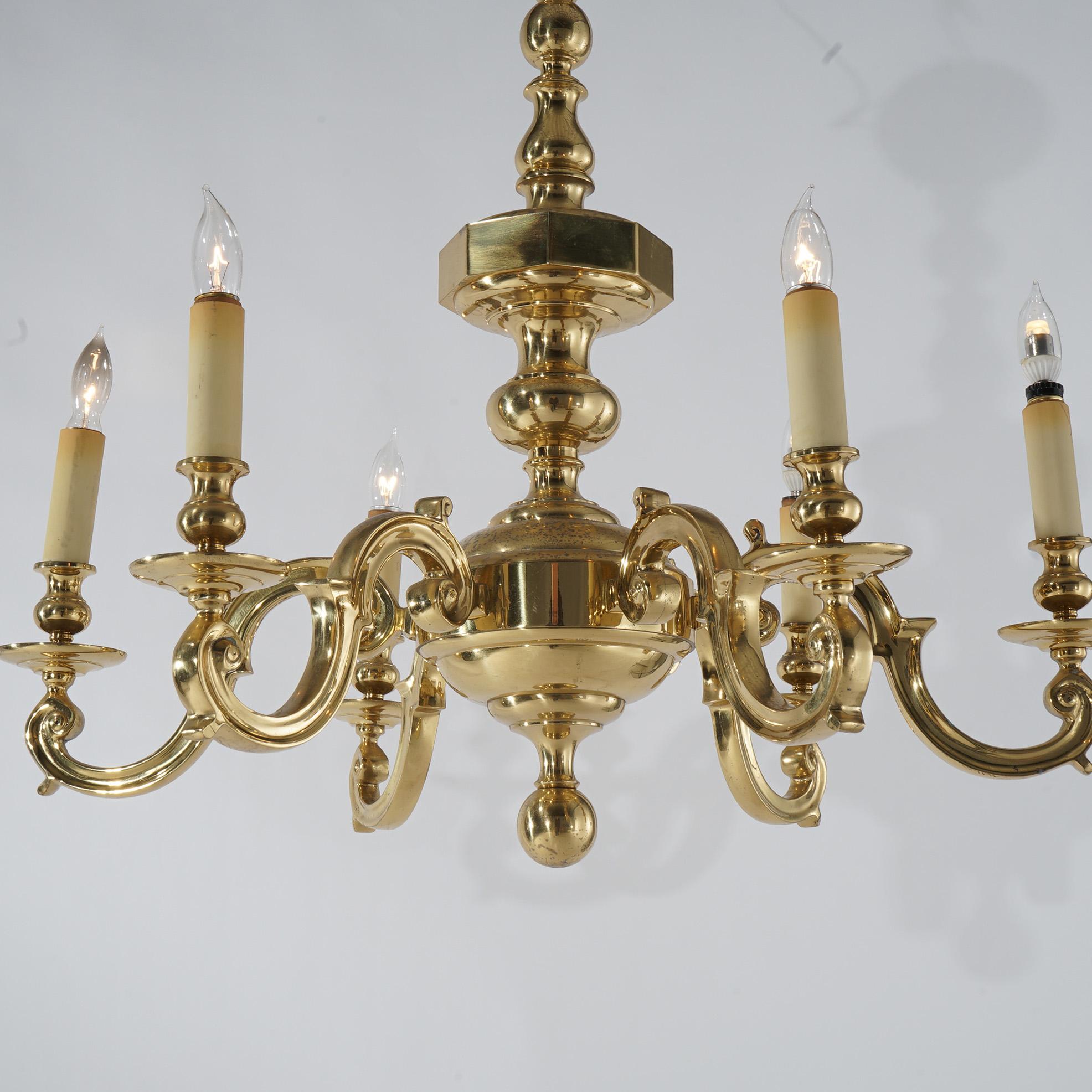 ***Ask About Reduced In-House Delivery Rates - Reliable Professional Service & Fully Insured***
Large Antique Neoclassical Brass Chandelier with Six Scroll Form Arms and Faceted Font, c1930

Measures- 32''H x 32.5''W x 32.5''D