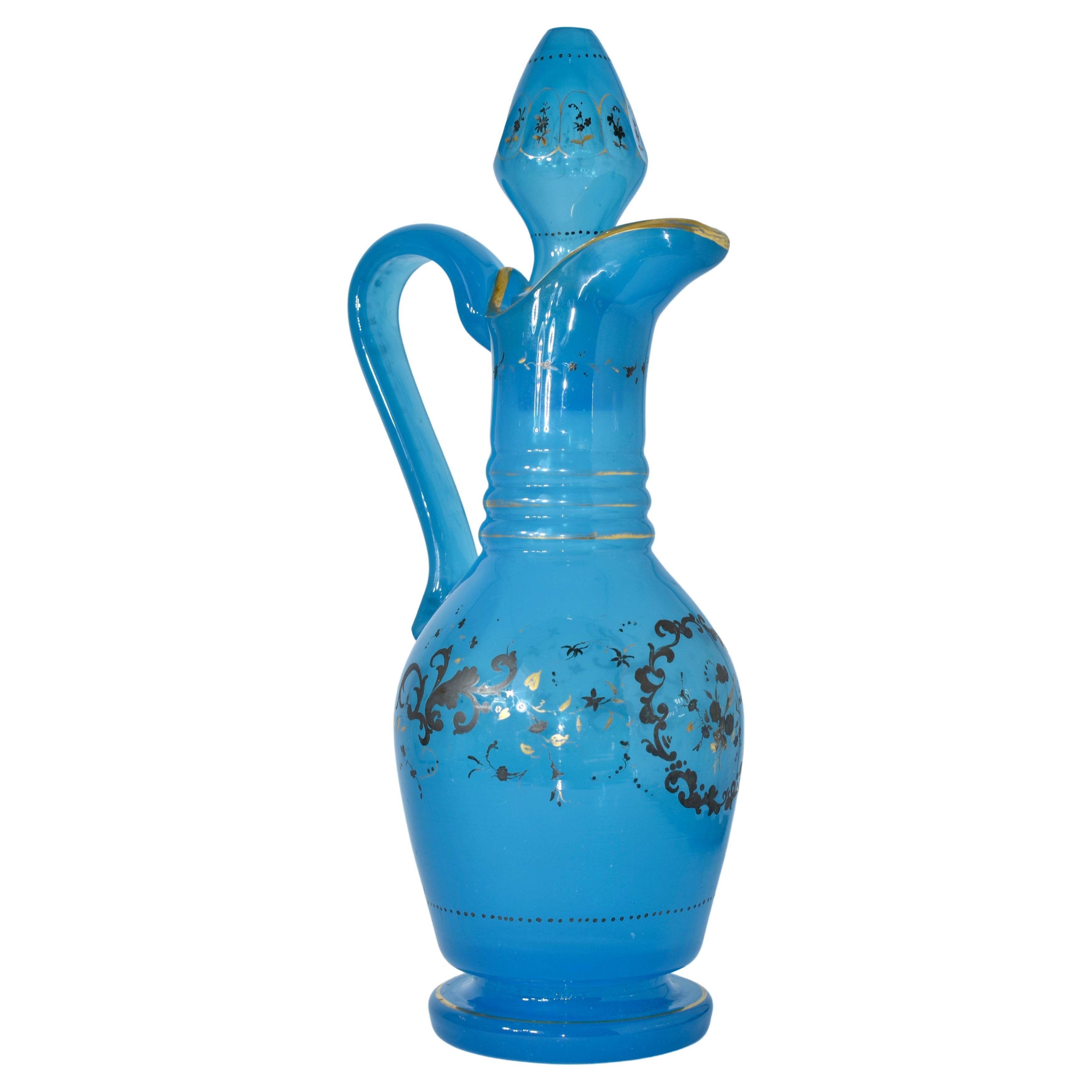 19th century Bohemian Glass Decanter, Ewer, Pitcher

Impressive Size, Blue Opaline Glass with Silver Overlay Design and Gilding Highlights

Bohemia, 19th century.