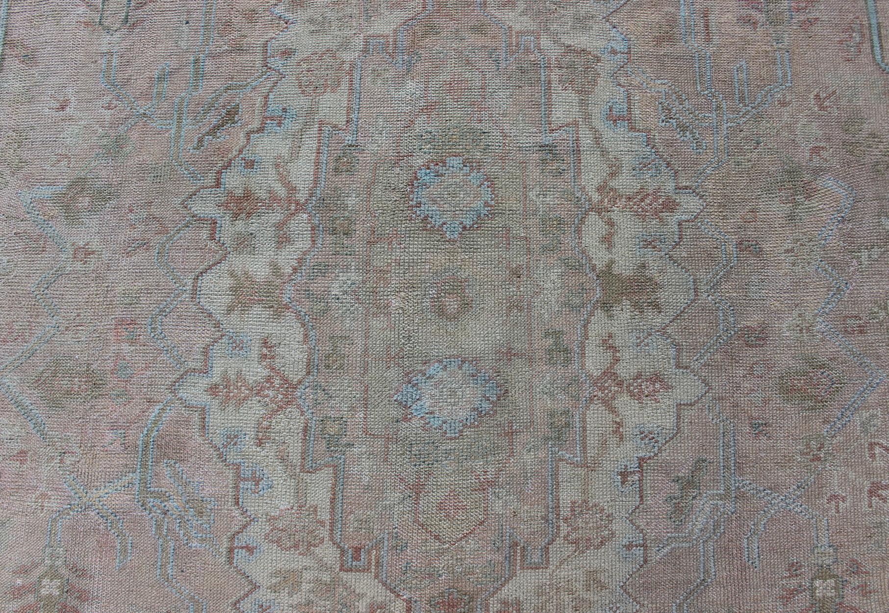 Large Antique Oushak Carpet in Light Pink Background with Light Blue Highlights For Sale 1