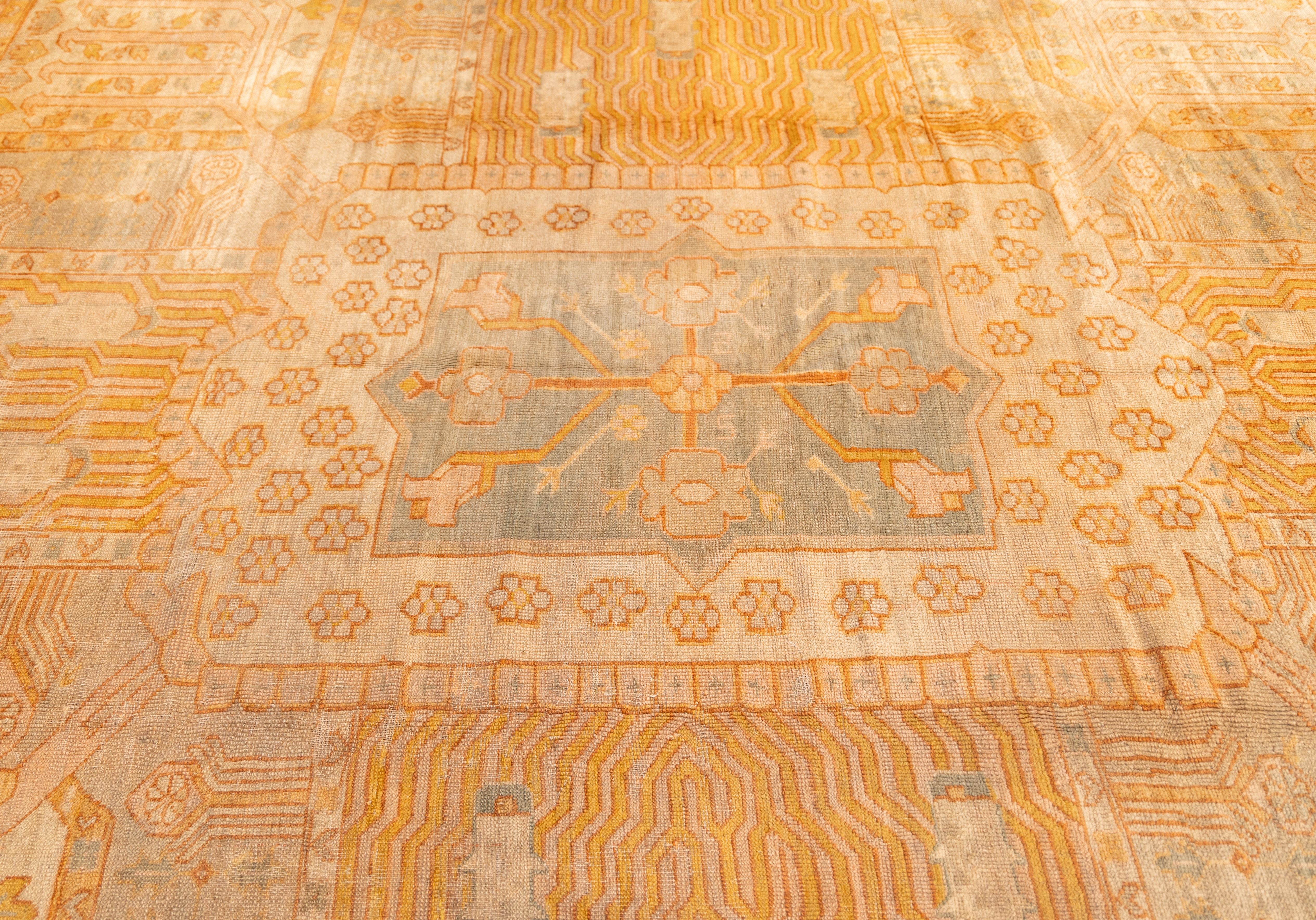 Turkish Large antique oushak rug with garden design For Sale