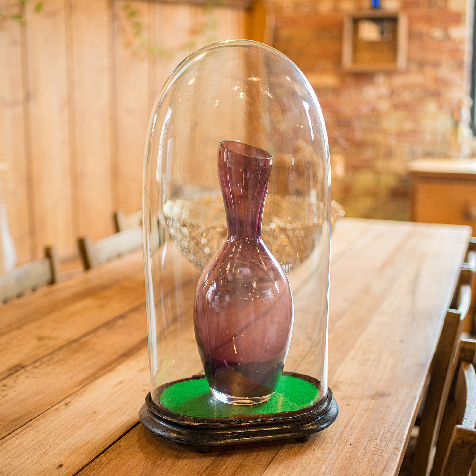 
This is a large antique oval clock dome. An English, glass ornament display showcase, dating to the Victorian period, circa 1900.

Fascinating proportion and period display appeal
Presents a desirable aged patina throughout
Clear, bright view to