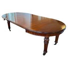 Large antique oval dining room table
