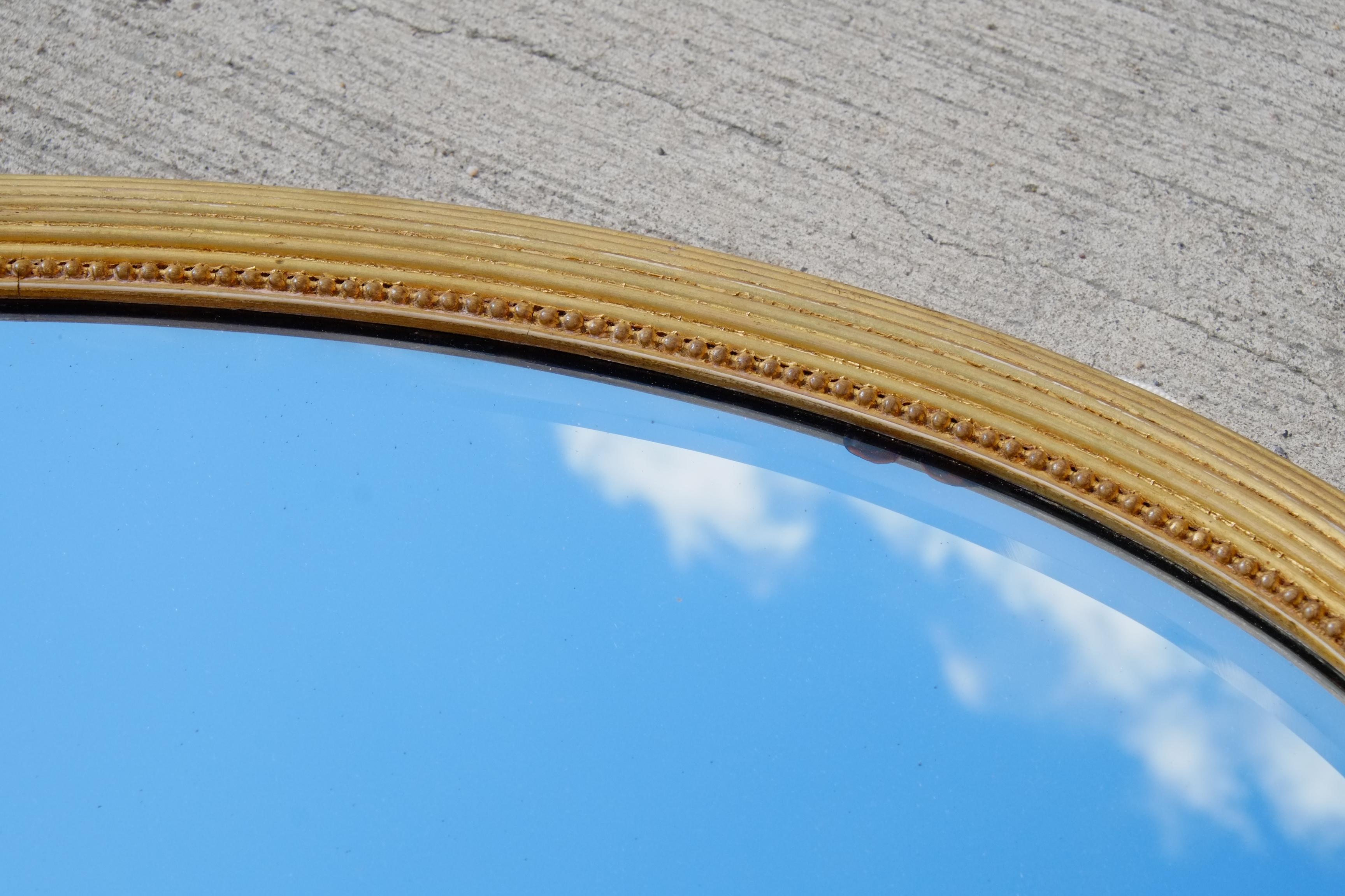 Large Antique Oval Gilt Wood Bevelled Mirror In Good Condition In Leicester, GB