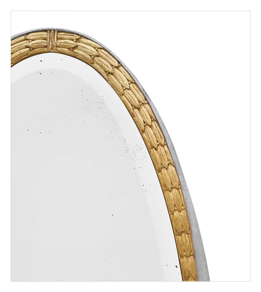 Début du 20ème siècle Grand miroir ovale ancien de la période Art déco, de 1928. Doré et Silver. en vente