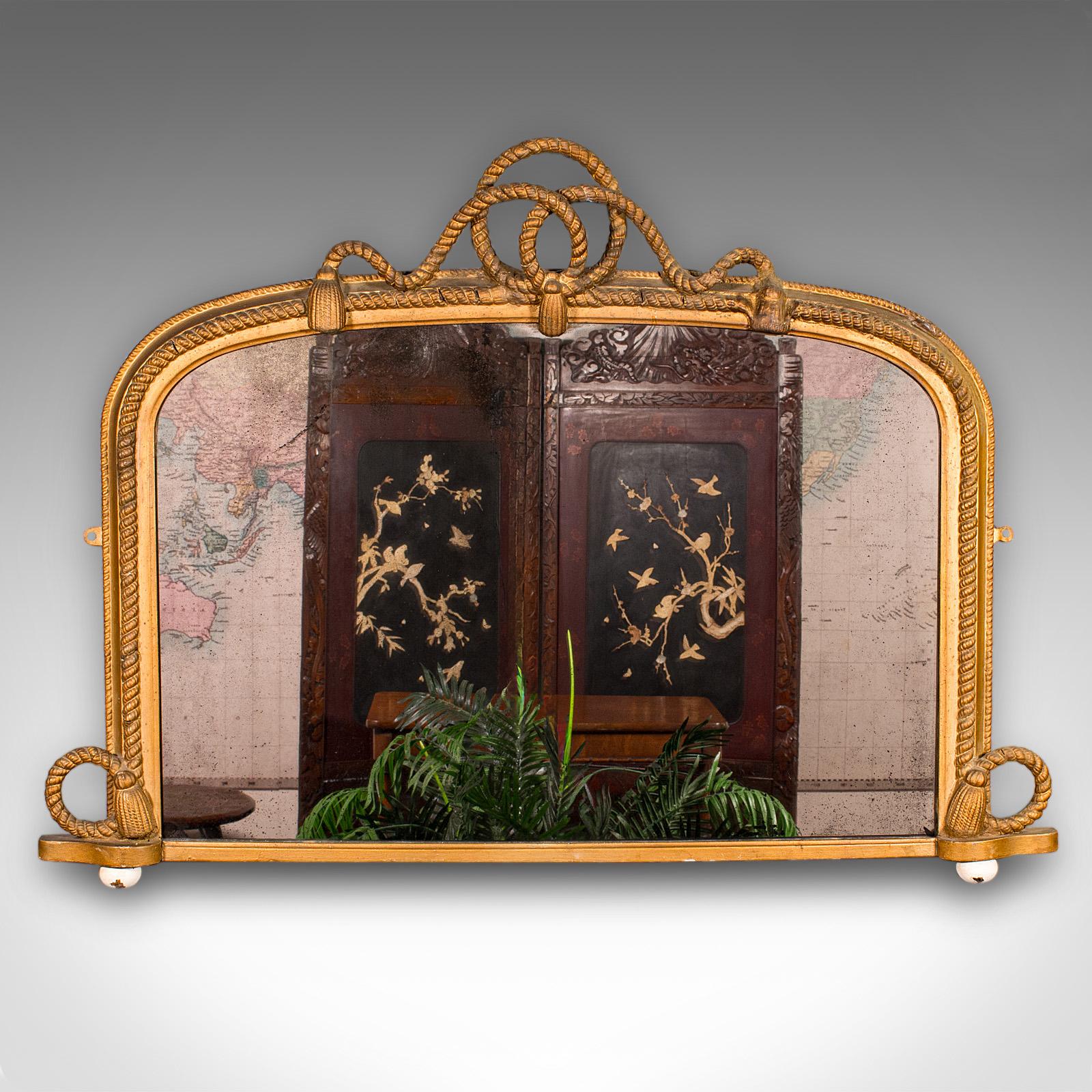 Dies ist ein großer antiker Übermantelspiegel. Ein englischer Lounge-Spiegel aus Vergoldung und Quecksilberglas mit ausgeprägtem nautischen Geschmack aus der frühen viktorianischen Zeit um 1850.

Beeindruckende Proportionen, ideal als imposanter