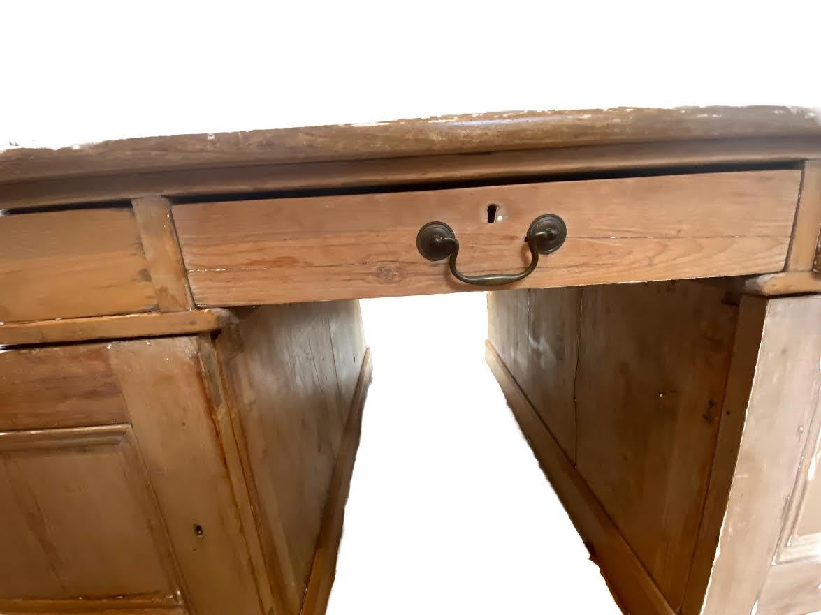 Very Large amazing partners desk. English solid wood with multiple drawers and cabinets for lots of storage. Hand made dove tailed joints, brass handles and locks. The pictures are an accurate description of this unique desk, a real treasure.