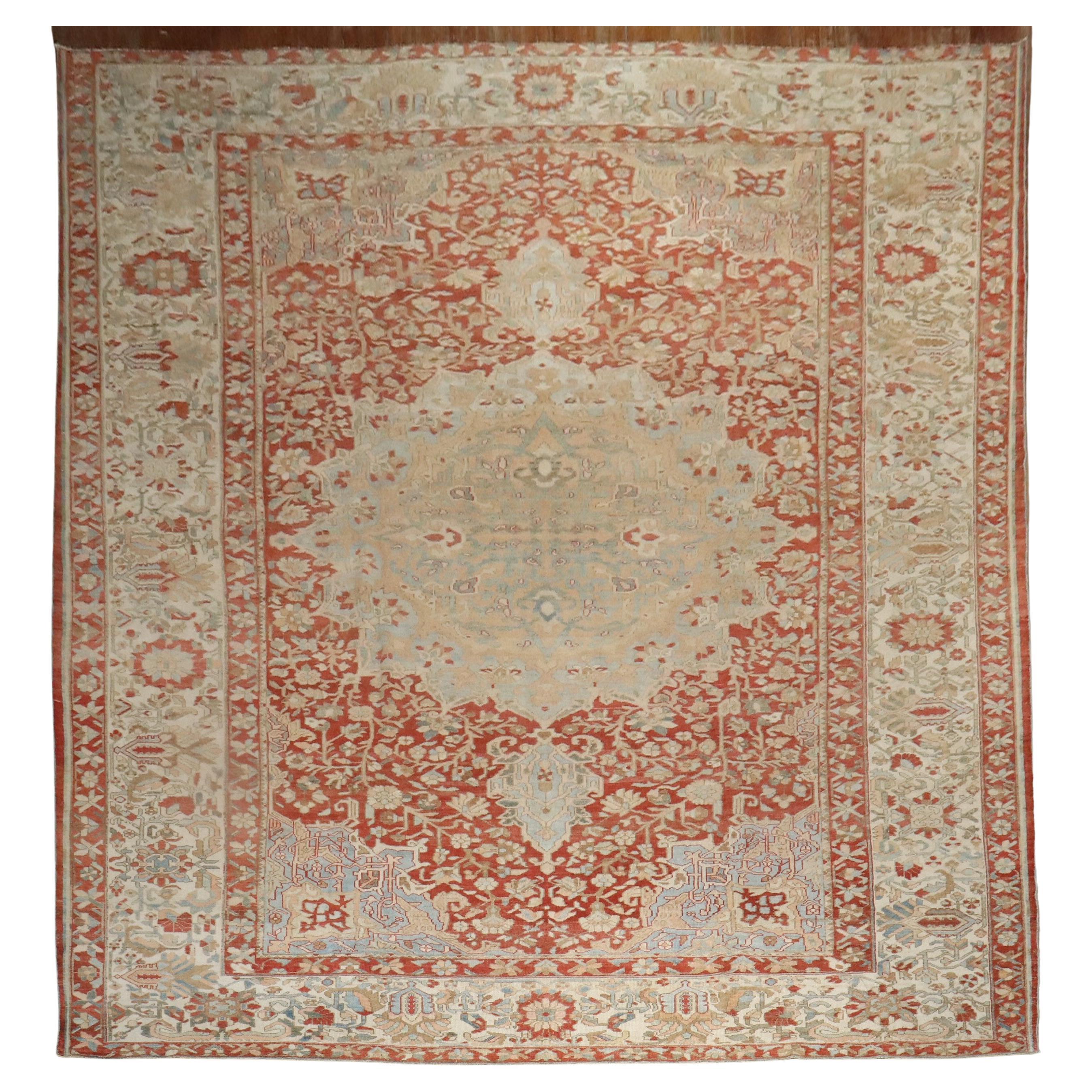 Oversize geometric Persian Bakhtiari rug in rustic tones. Brick red field with dominant accents in khaki, ivory, and sky blue

Measures: 12'5'' x 18'3'' circa 1930.