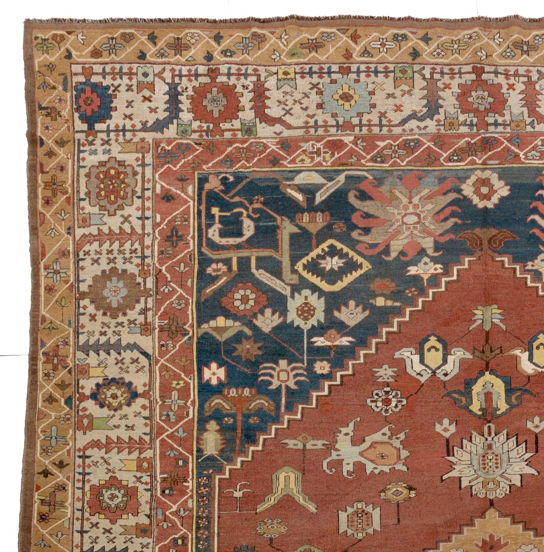 This early masterpiece of woven art from Northwest Persia is one of the best examples of Bakshaish rugs that are sought after for their soft and highly decorative colors and superbly drawn designs. The wonderfully saturated harmonious colors of this