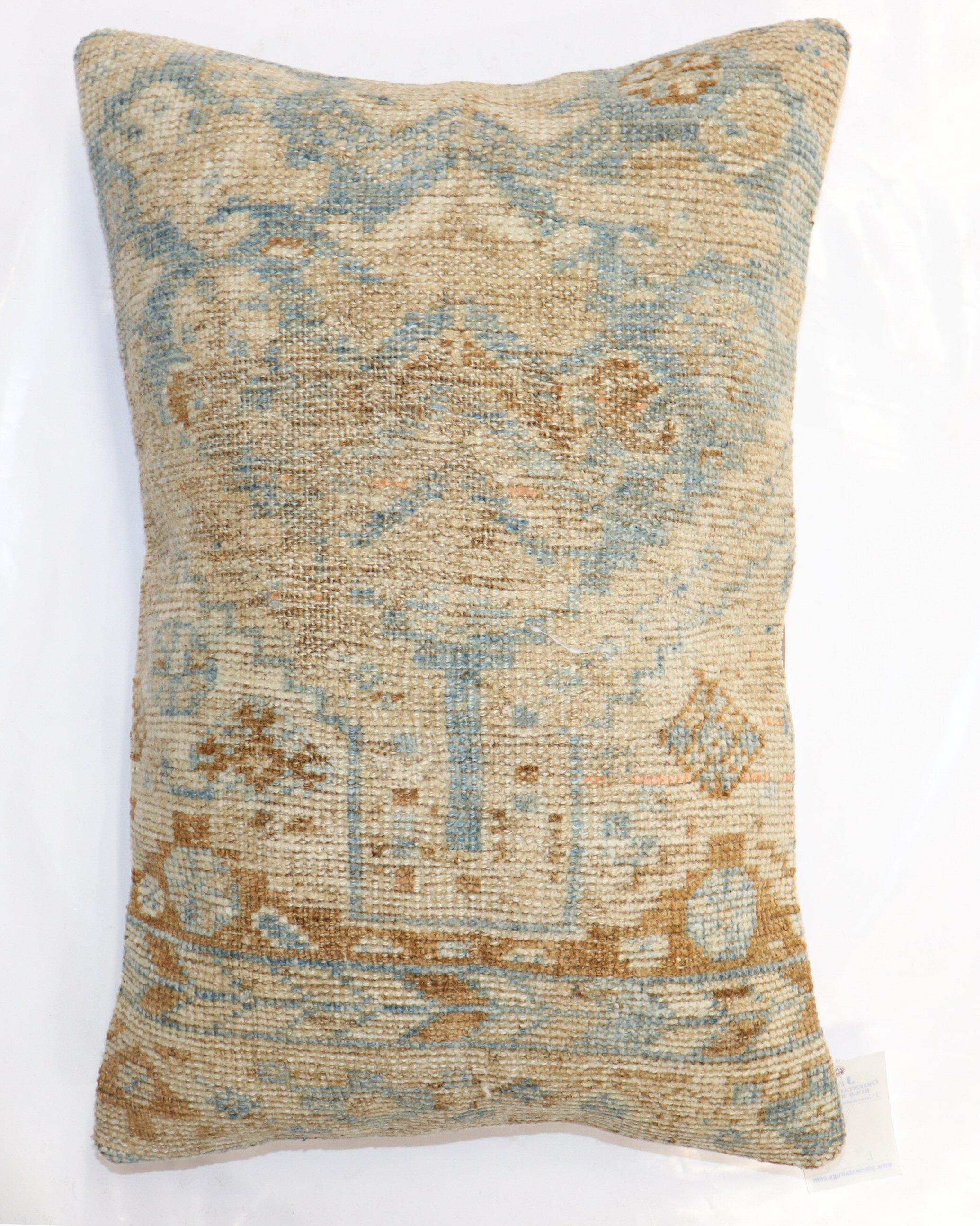 Pillow made from a late 19th-century antique Persian Bakshaish rug with cotton back. Zipper closure.

Measures: 16'' x 23''.