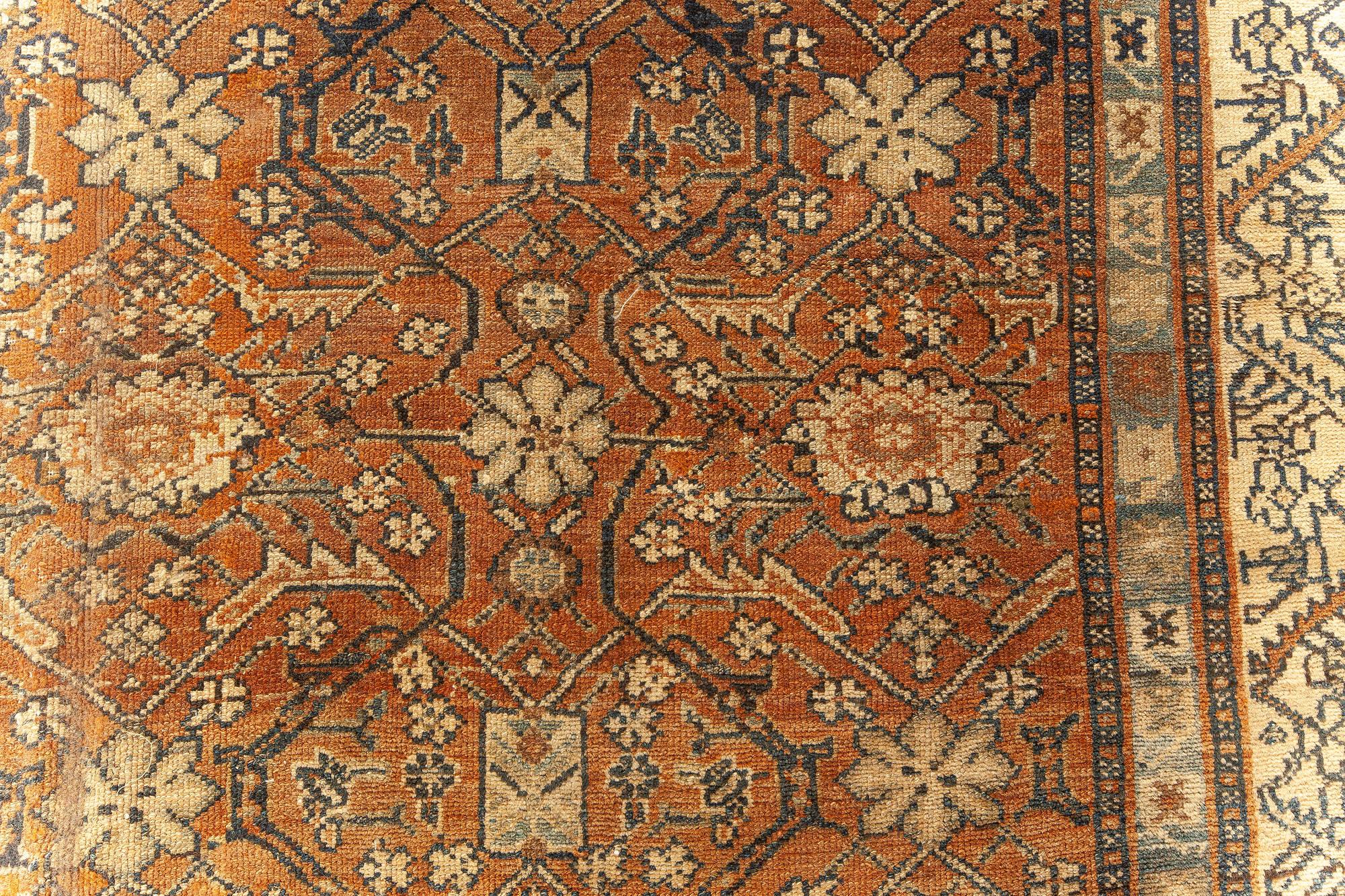 Large antique Persian Bibikabad brown handmade wool rug
Size: 14'4